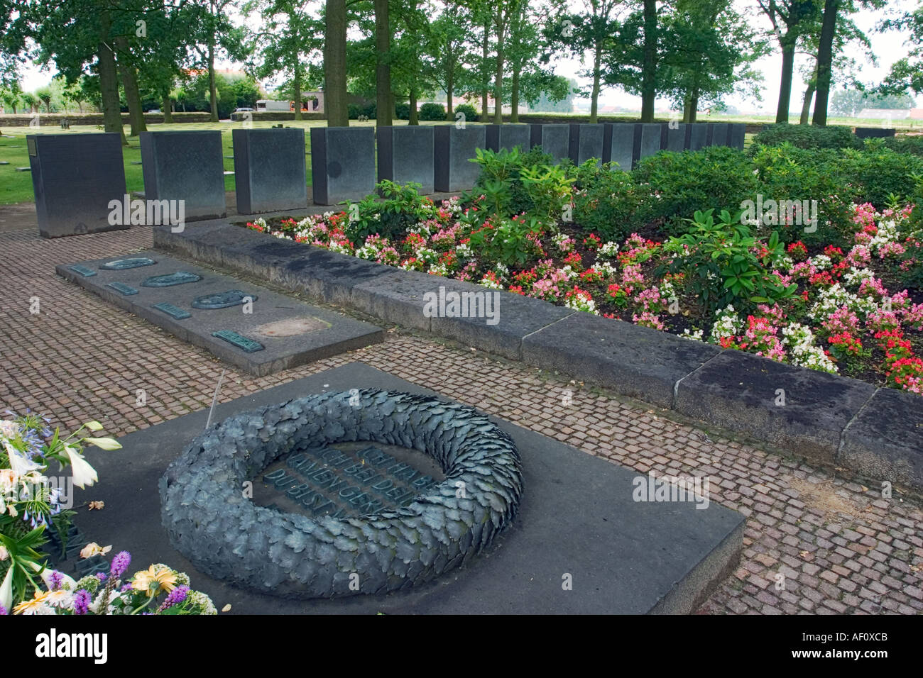Memorial garden with wall of names of fallen German soldiers Langemarck German Military Cemetary Belgium Stock Photo