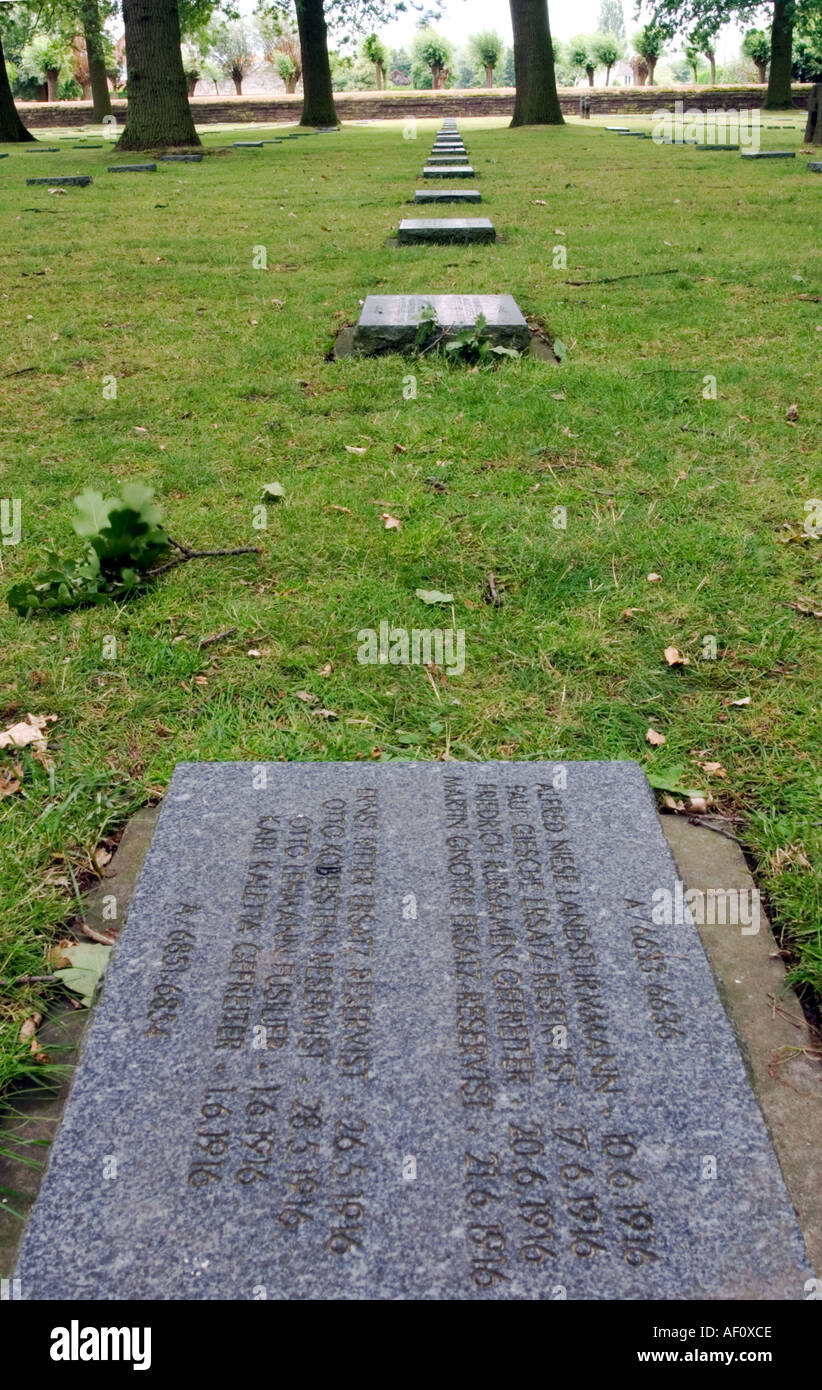 Burial plaques on mass graves of German soldiers at Langemarck German Military Cemetary Belgium Stock Photo