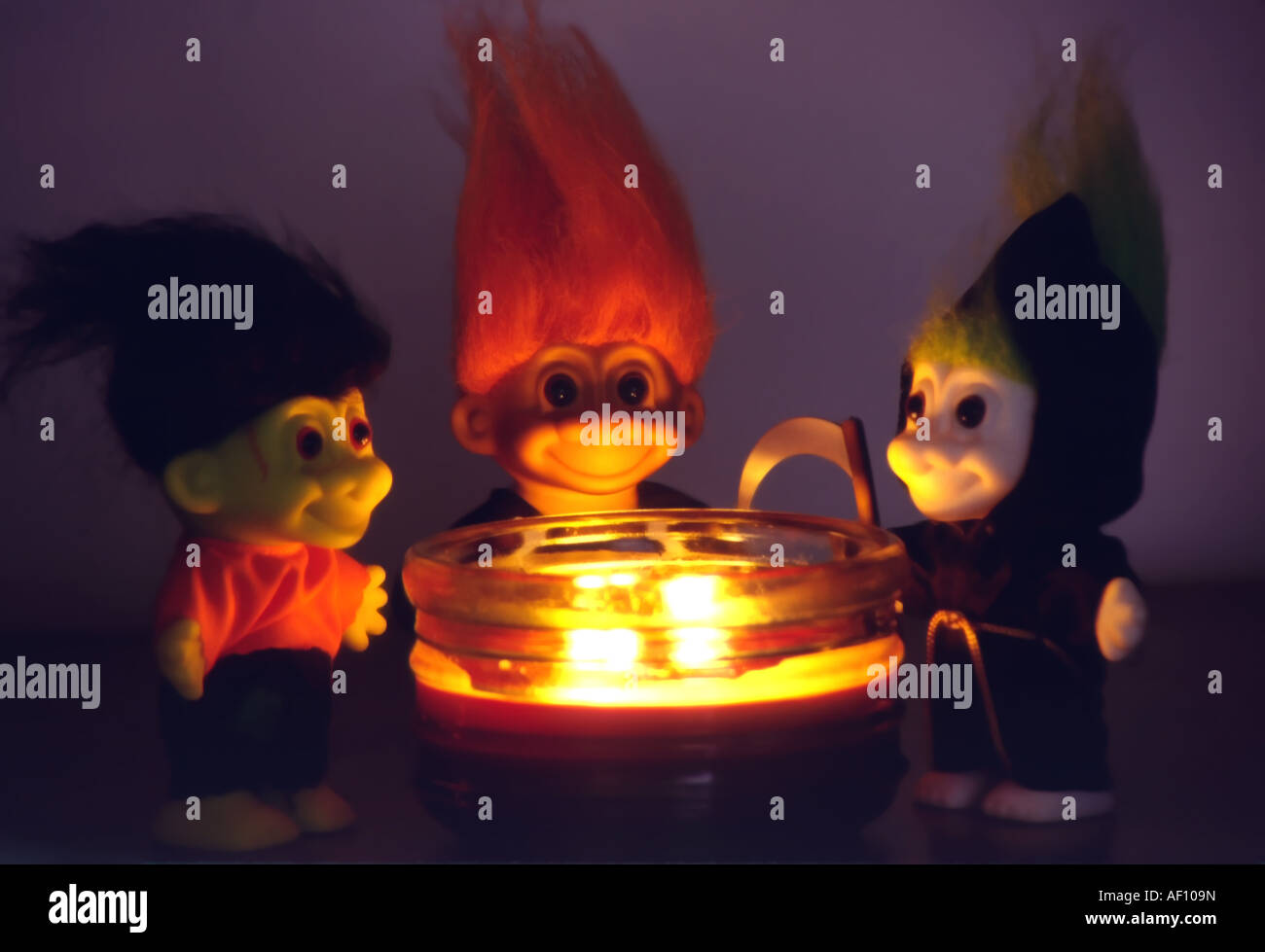 trollingHalloween knick knacks by candlelight make a good holiday themed still life. Stock Photo