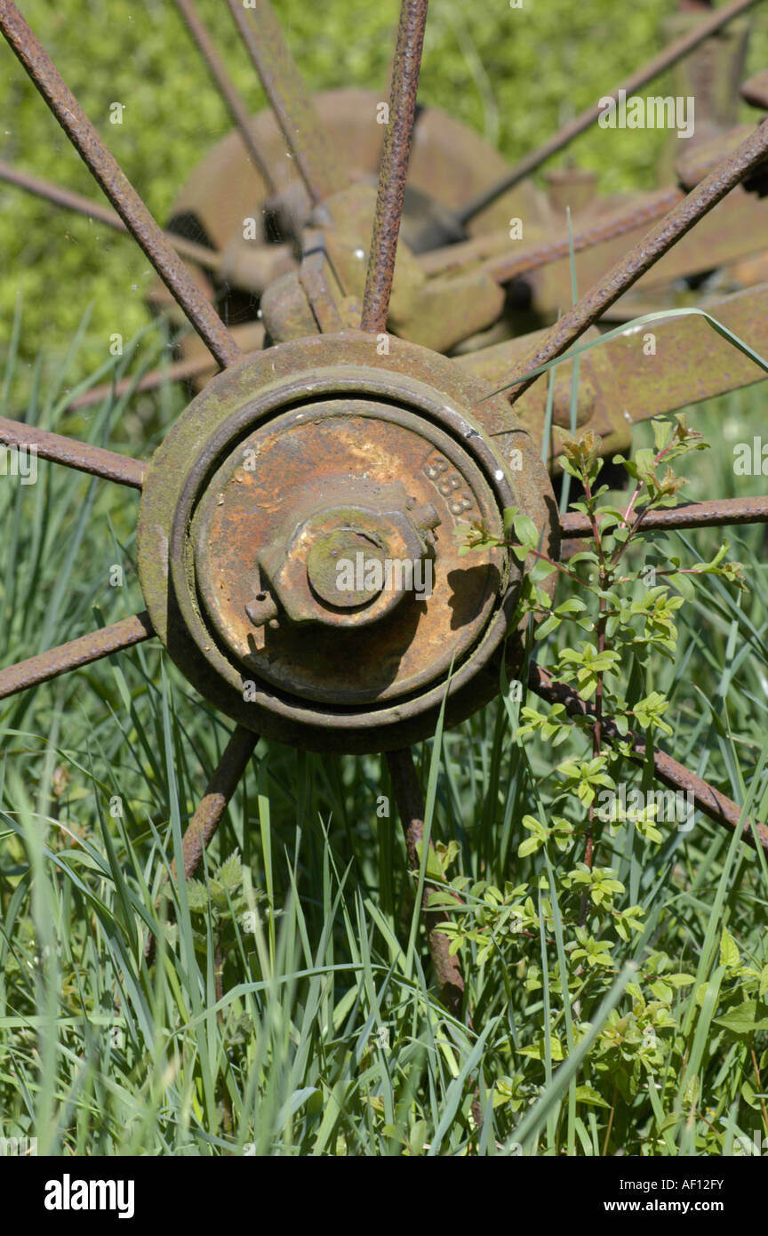 Rusting agricultural farm equipment seed drill Union farm Gressenhall