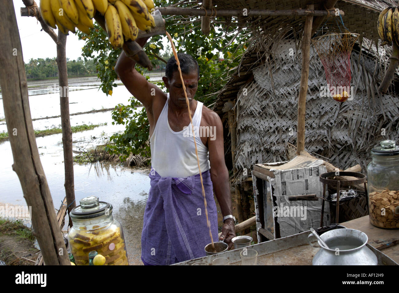 LOCAL TEA SHOP ON THE BANKS OF BACKWATERS, ALAPPUZHA Stock Photo
