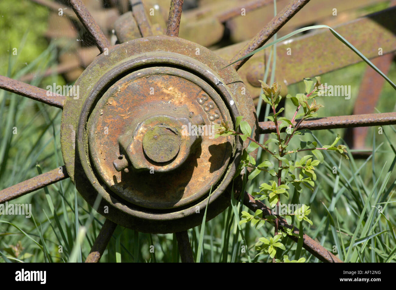 Rusting agricultural farm equipment seed drill Union farm Gressenhall