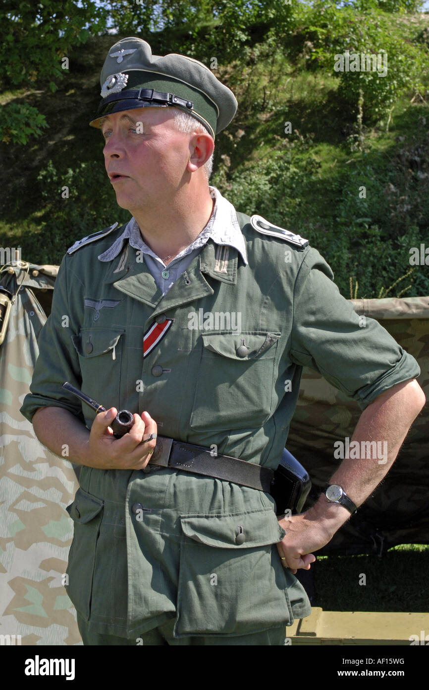 Man in a re enactment group dressed as a German Army Infantry soldier Stock Photo