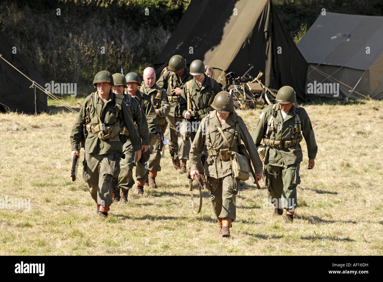 Men in a re enactment group dressed as a USArmy Infantry soldiers Stock Photo