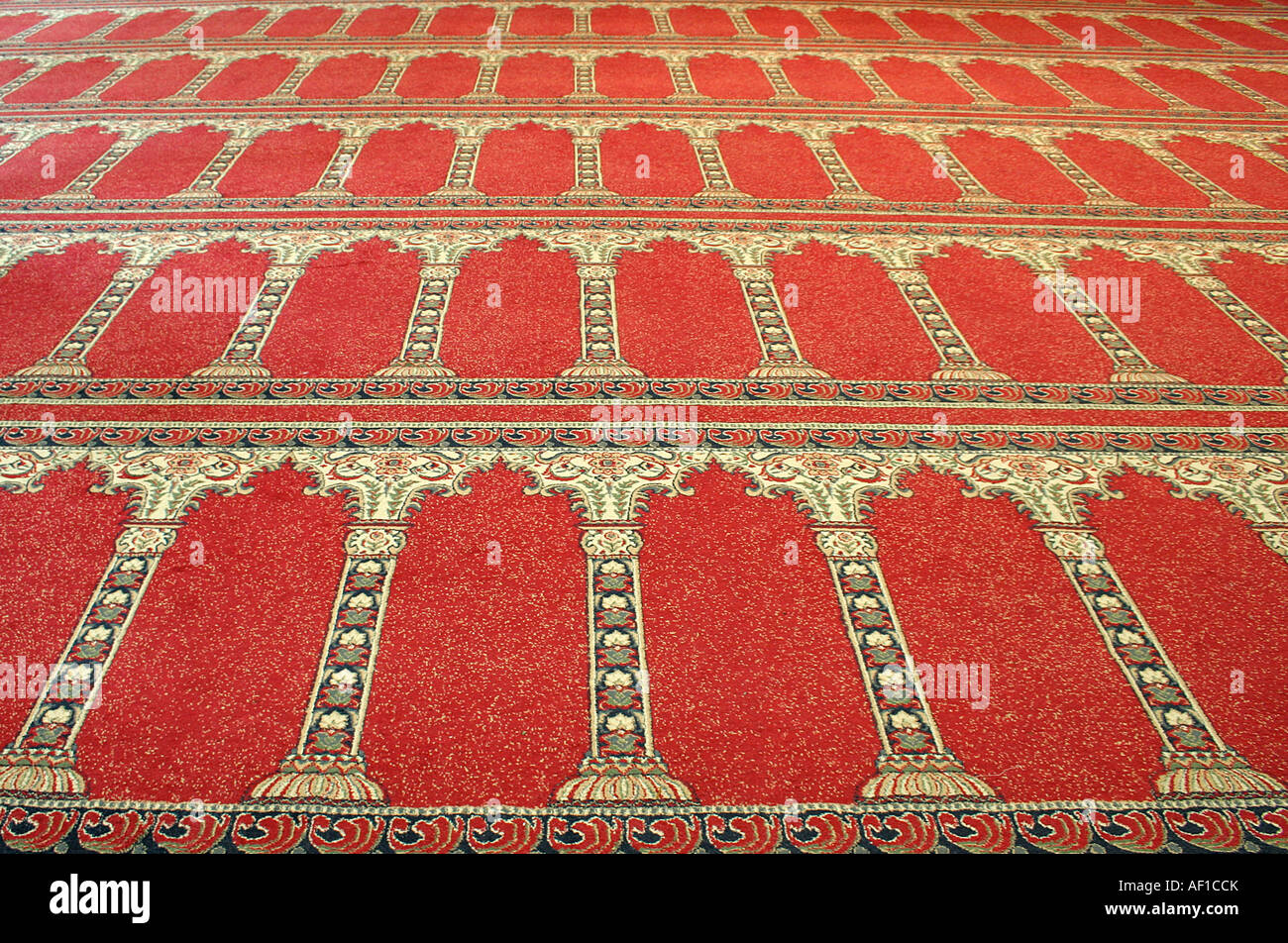 red arabian floor carpet in mosque Stock Photo Alamy