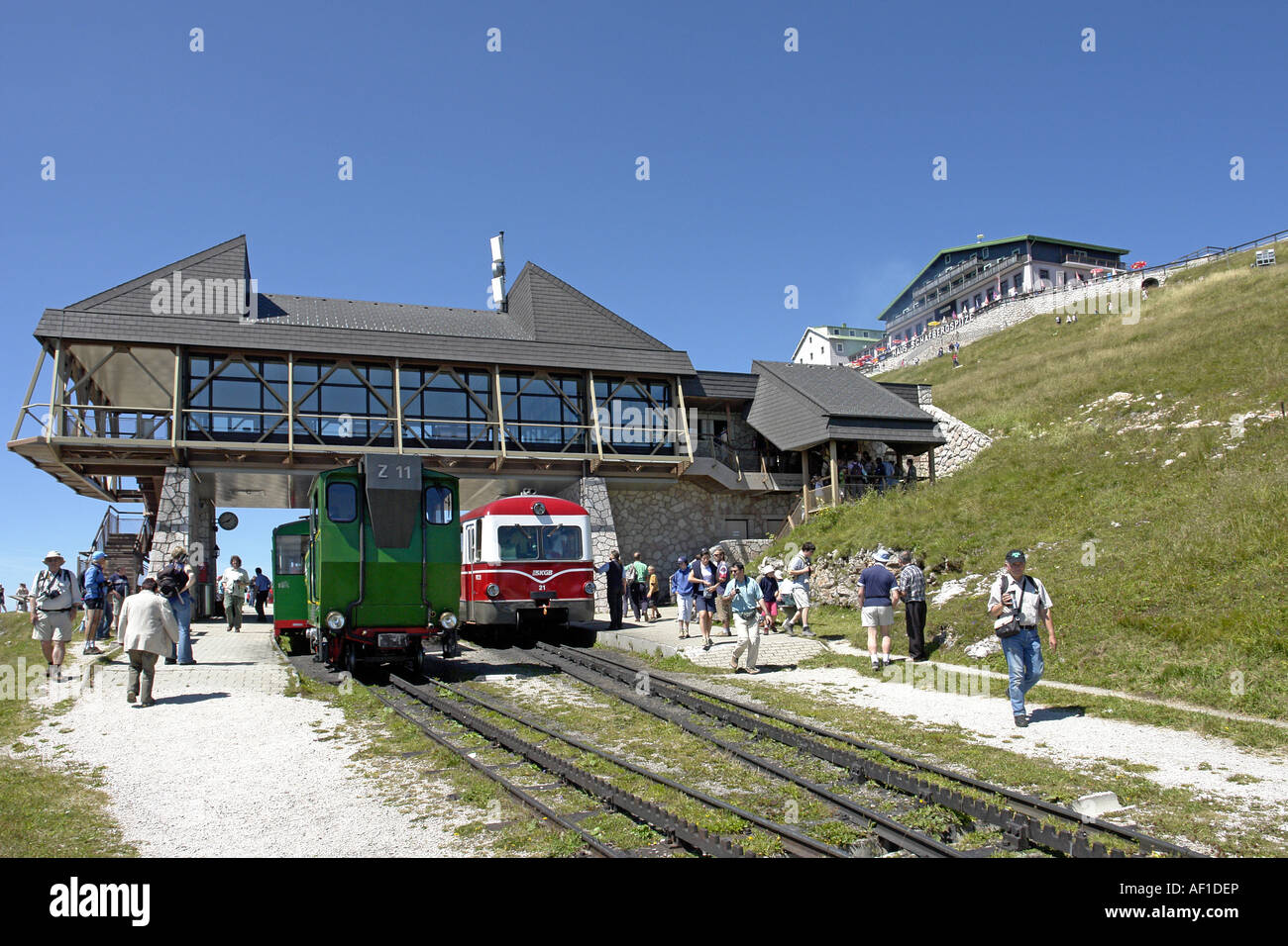 Steam engine Z 11 with green coaches waiting to take passengers from Schafberg to St. Wolfgang on a sunny summer day Stock Photo