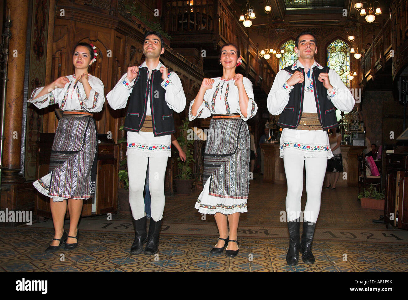 Dancers in national costume, Caru cu Bere Restaurant, Str Stavropoleos, Bucharest, Romania Stock Dancers in national costume, Caru cu Bere Restaurant, Str Stavropoleos, Bucharest, Romania Stock