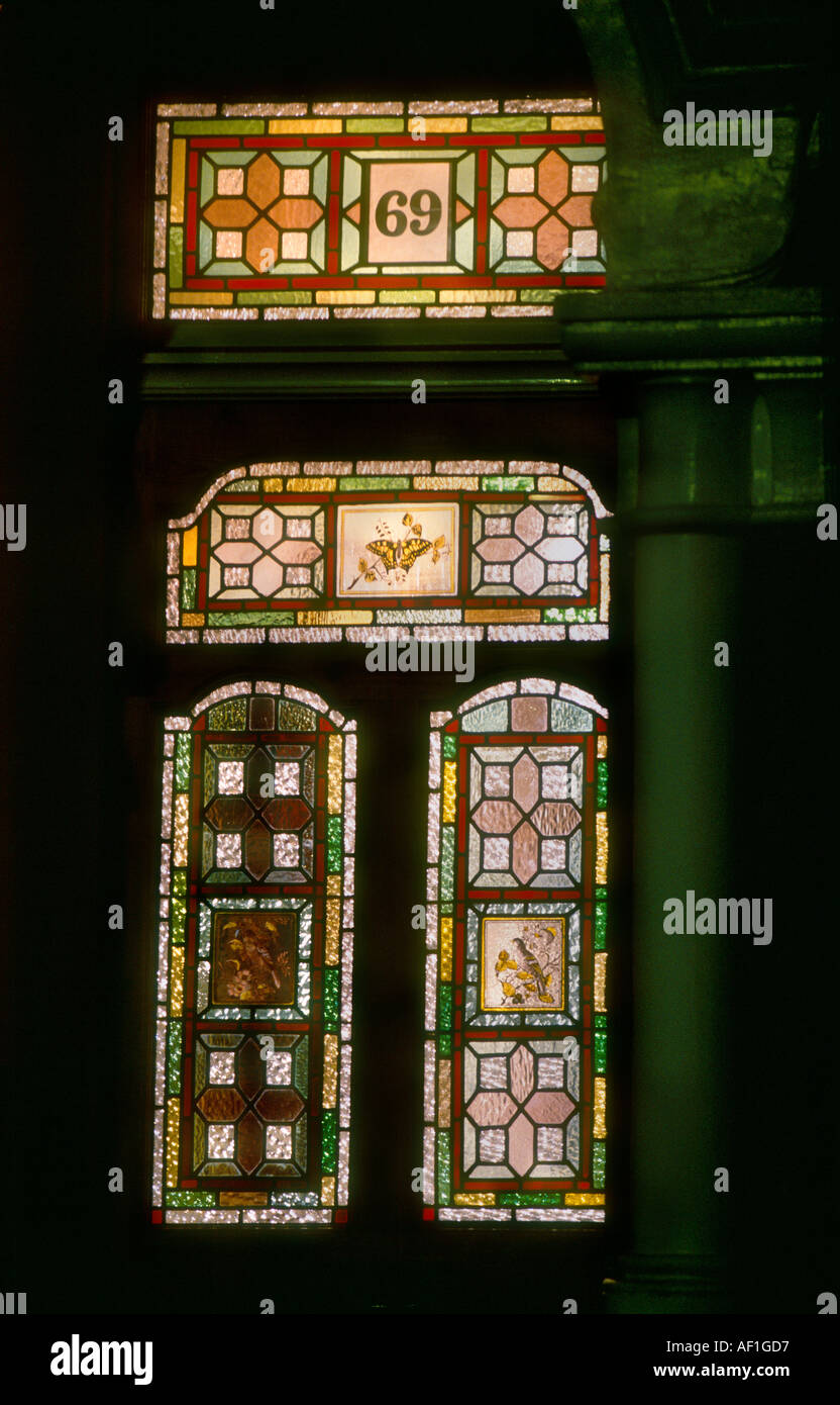 Stained Glass front door at night British Housing London Stock Photo