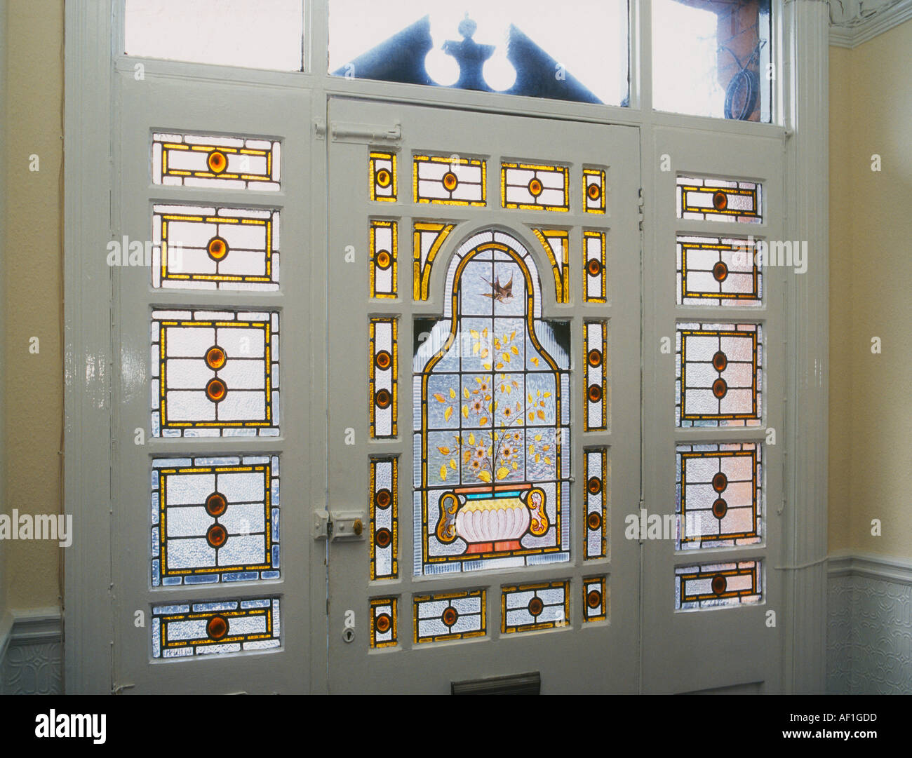 Decorative Edwardian Stained Glass front door taken from interior looking out British Housing