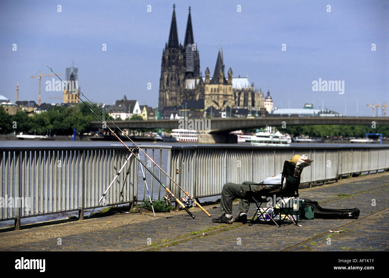 Angler Fishing In The River Rhine Cologne North Rhine Westphalia Germany Stock Photo Alamy