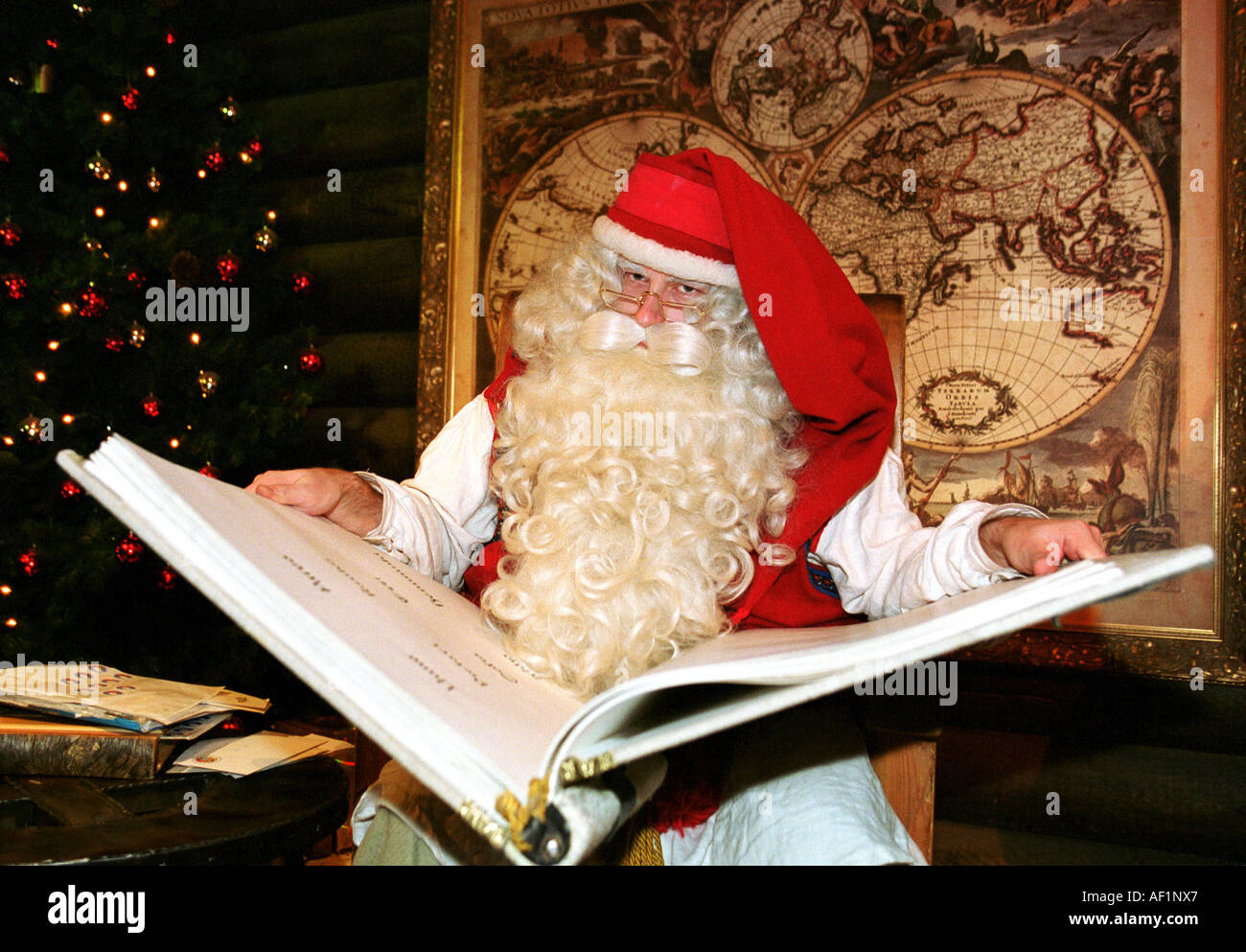 Santa Claus in his office at Santa Village Arctic Circle near Rovaniemi, Finland Stock Photo