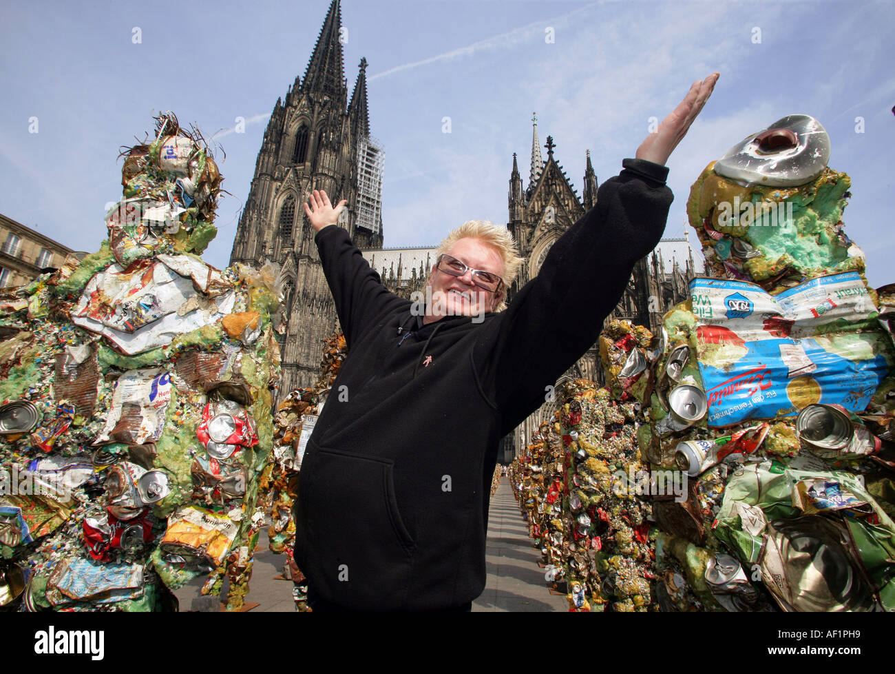 Artist HA Schult whitin his art installation 'trash people' in front of the Cologne Cathedrale, Germany Stock Photo
