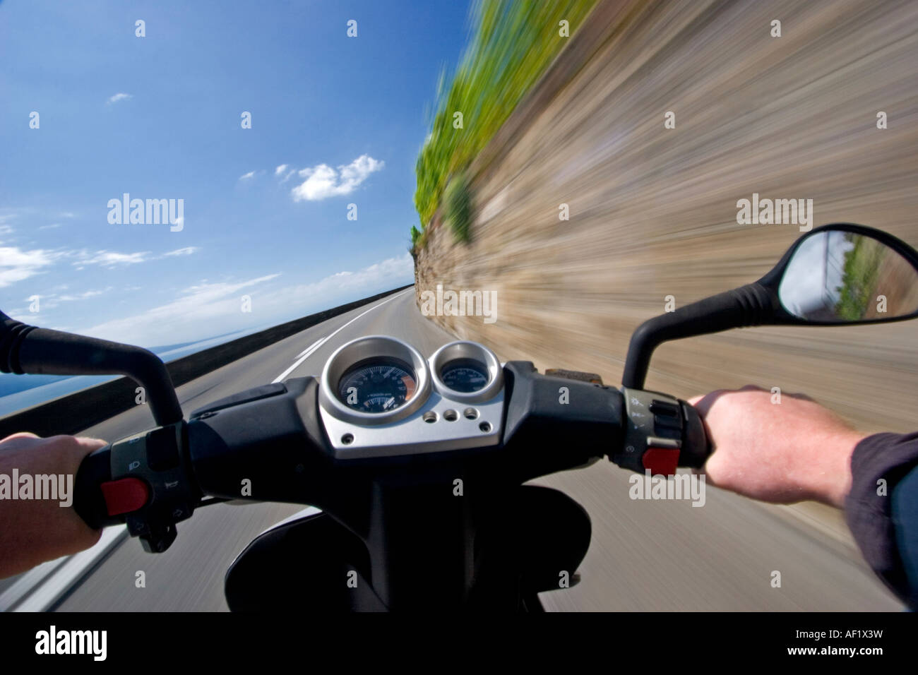 Speeding on a Scooter Stock Photo Alamy