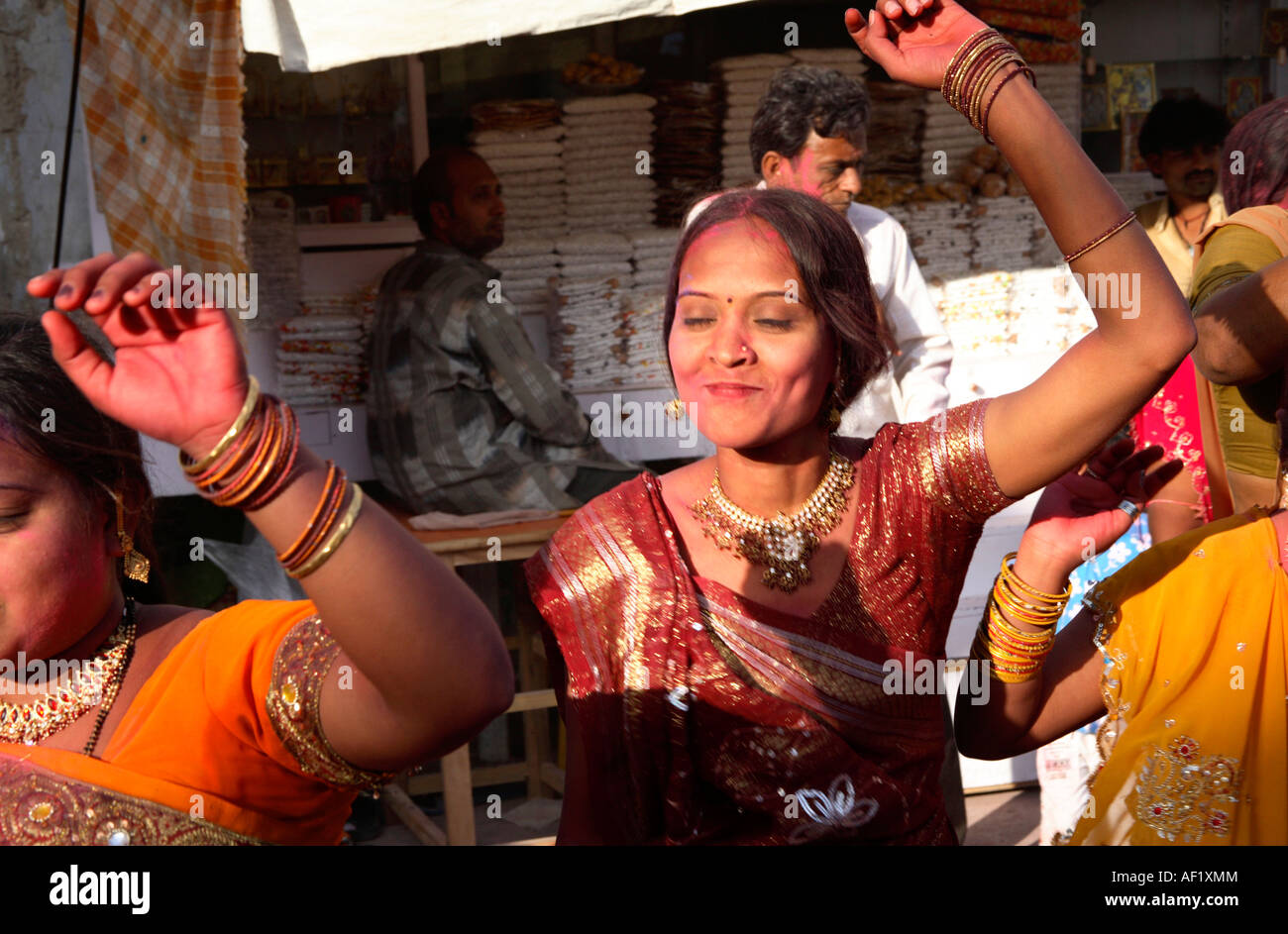 Indian women dancing celebrating holi spring festival of colours, Dwarka, Gujarat, India Stock Photo