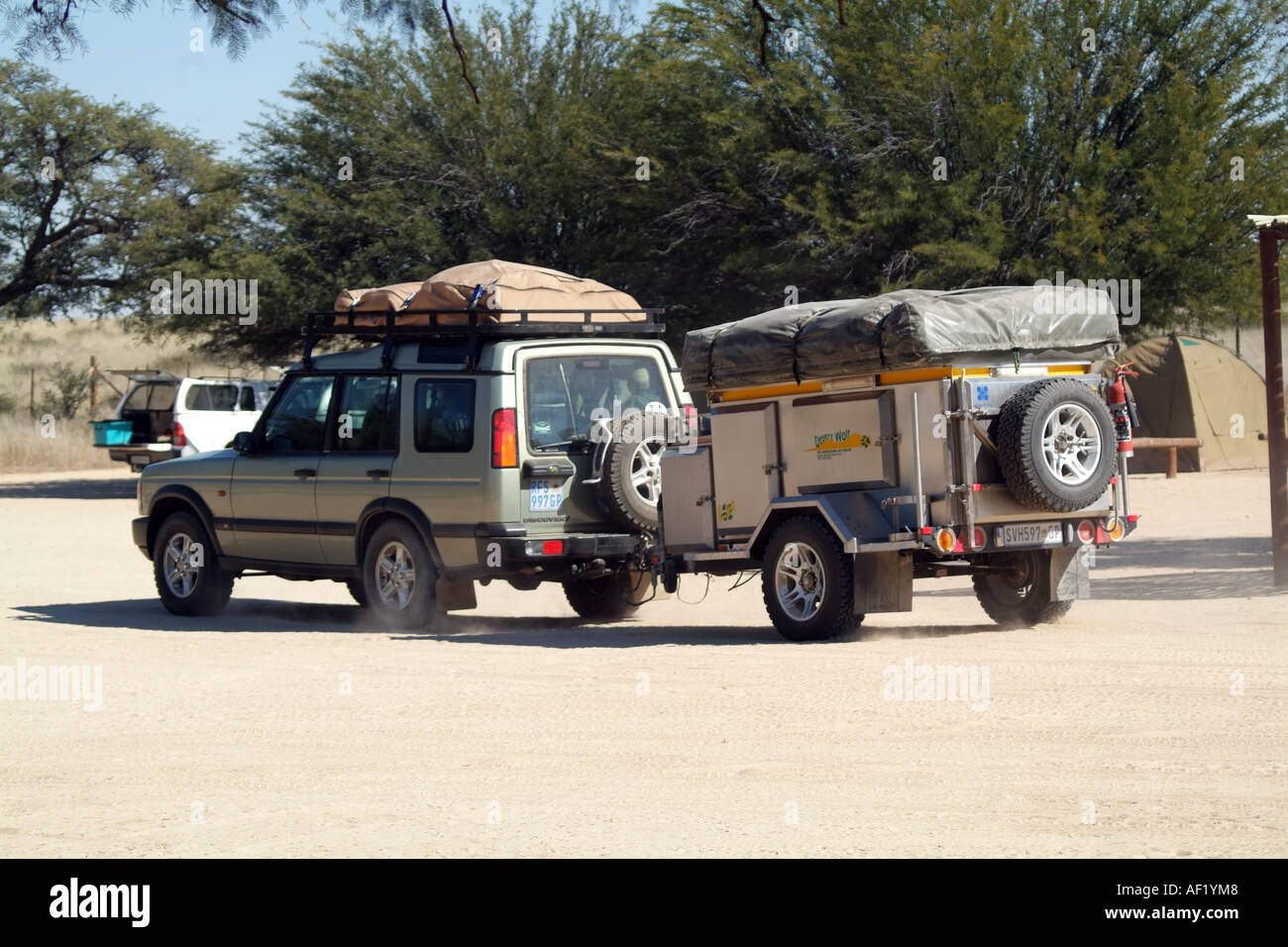 4X4 car pulling a trailer in the Kalahari. South Africa RSA Stock Photo