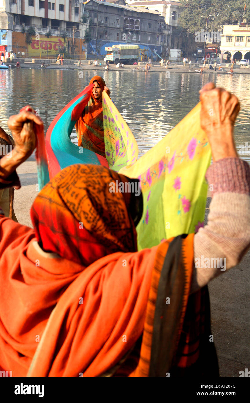 Indian women standing edge in hi-res stock photography and images - Alamy
