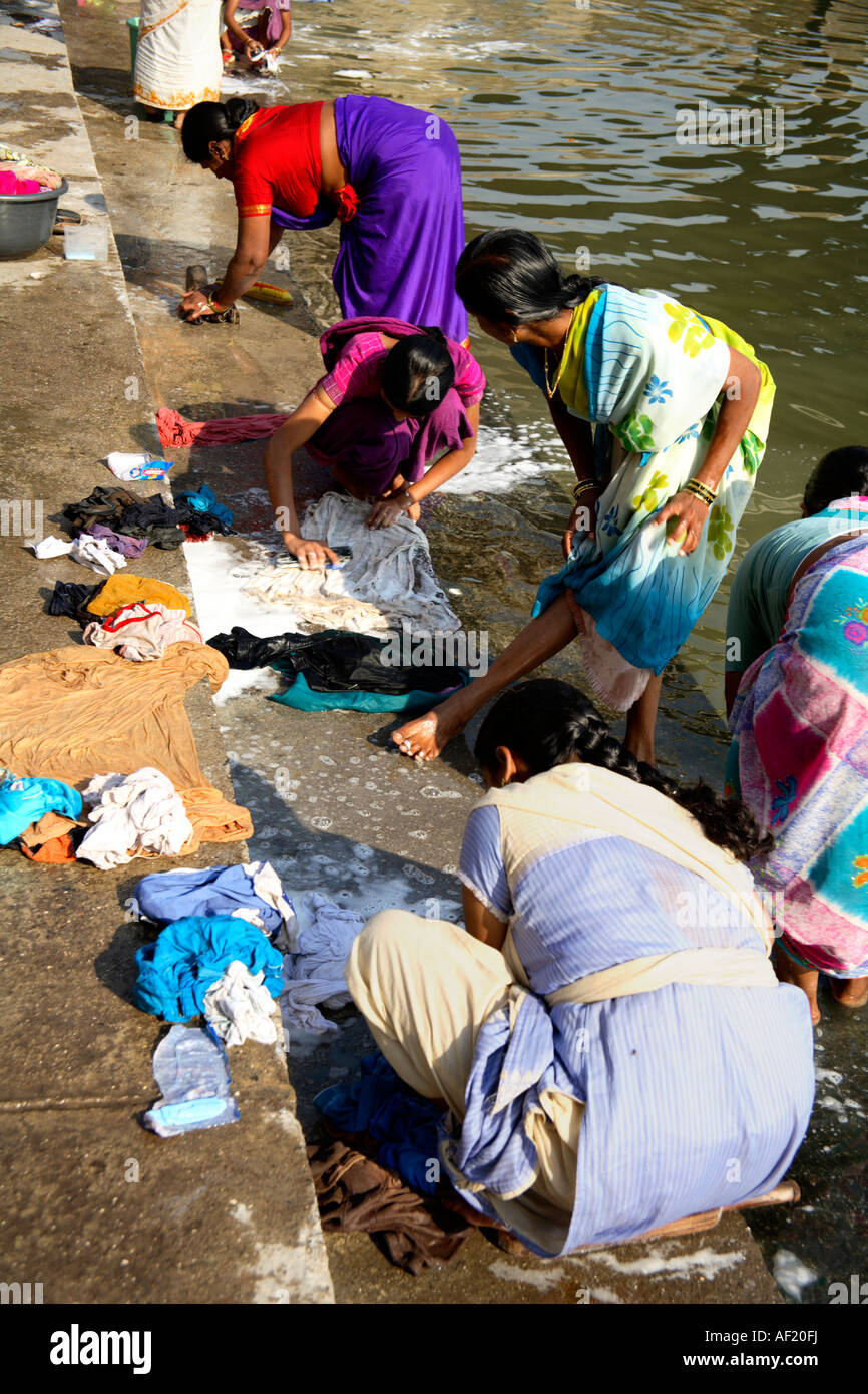 Indian Women Washing Clothing On Steps Of Ramkund Bathing Tank Nasik Maharashtra India Stock 
