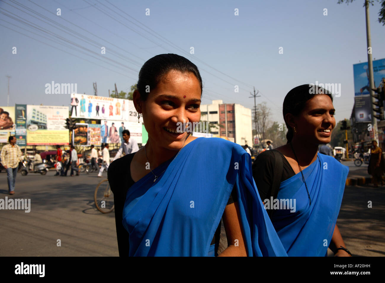 Indian College Girls wearing uniforms returning home from University, Nasik, India Stock Photo