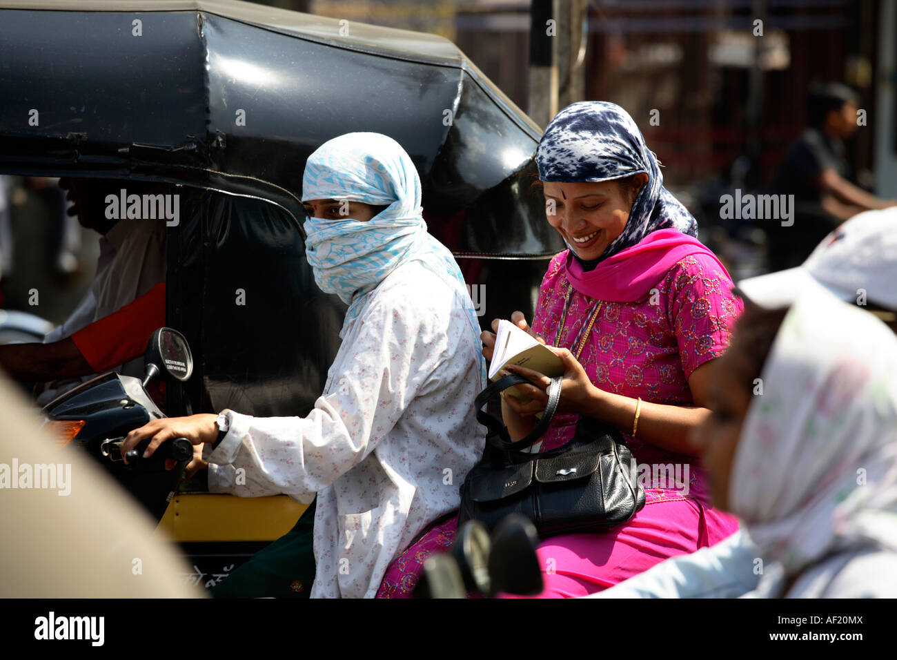 Scooter riding indian women hi-res stock photography and images - Alamy