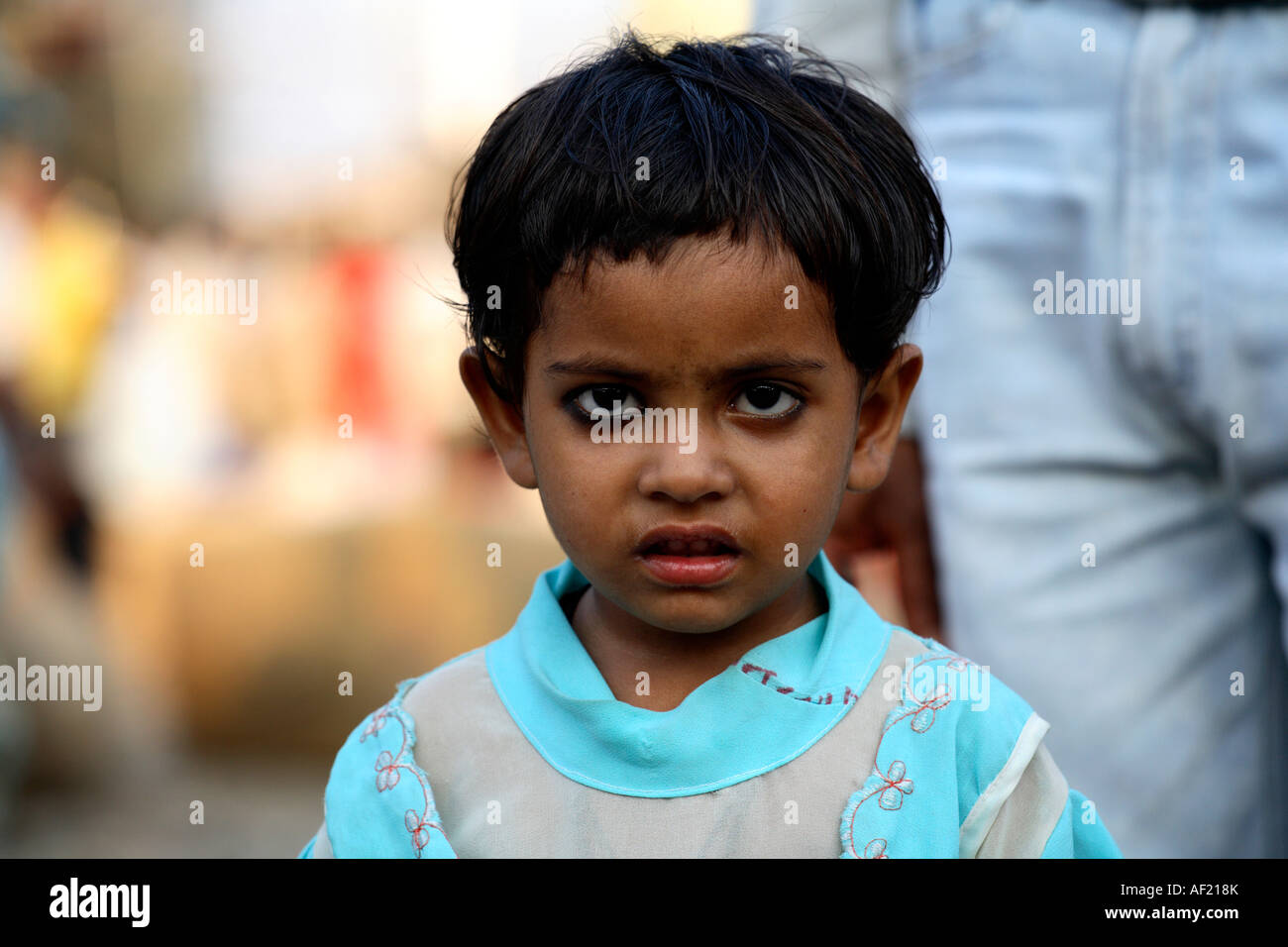 Young Indian child at railway station, Pune, India Stock Photo