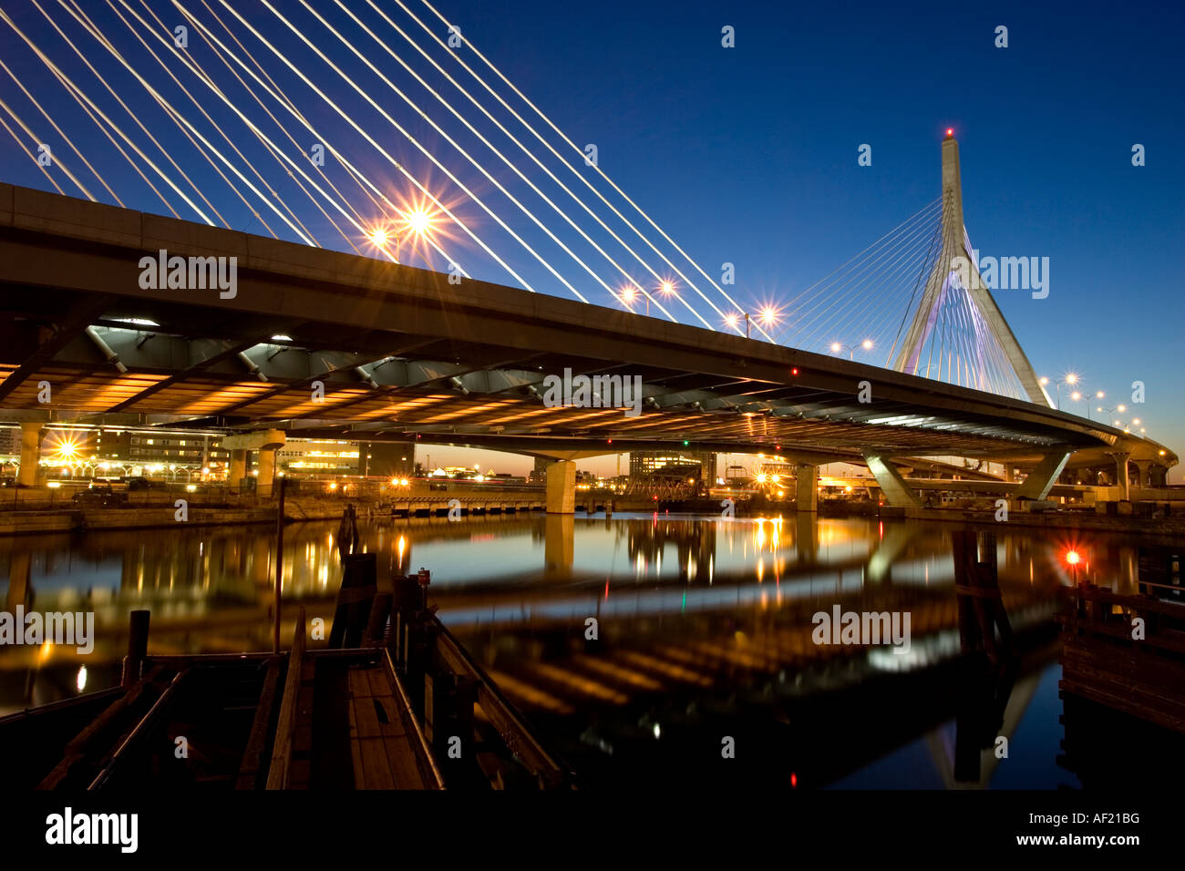 Zakim Bridge Boston over the Charles river at sunset or twilight Stock Photo