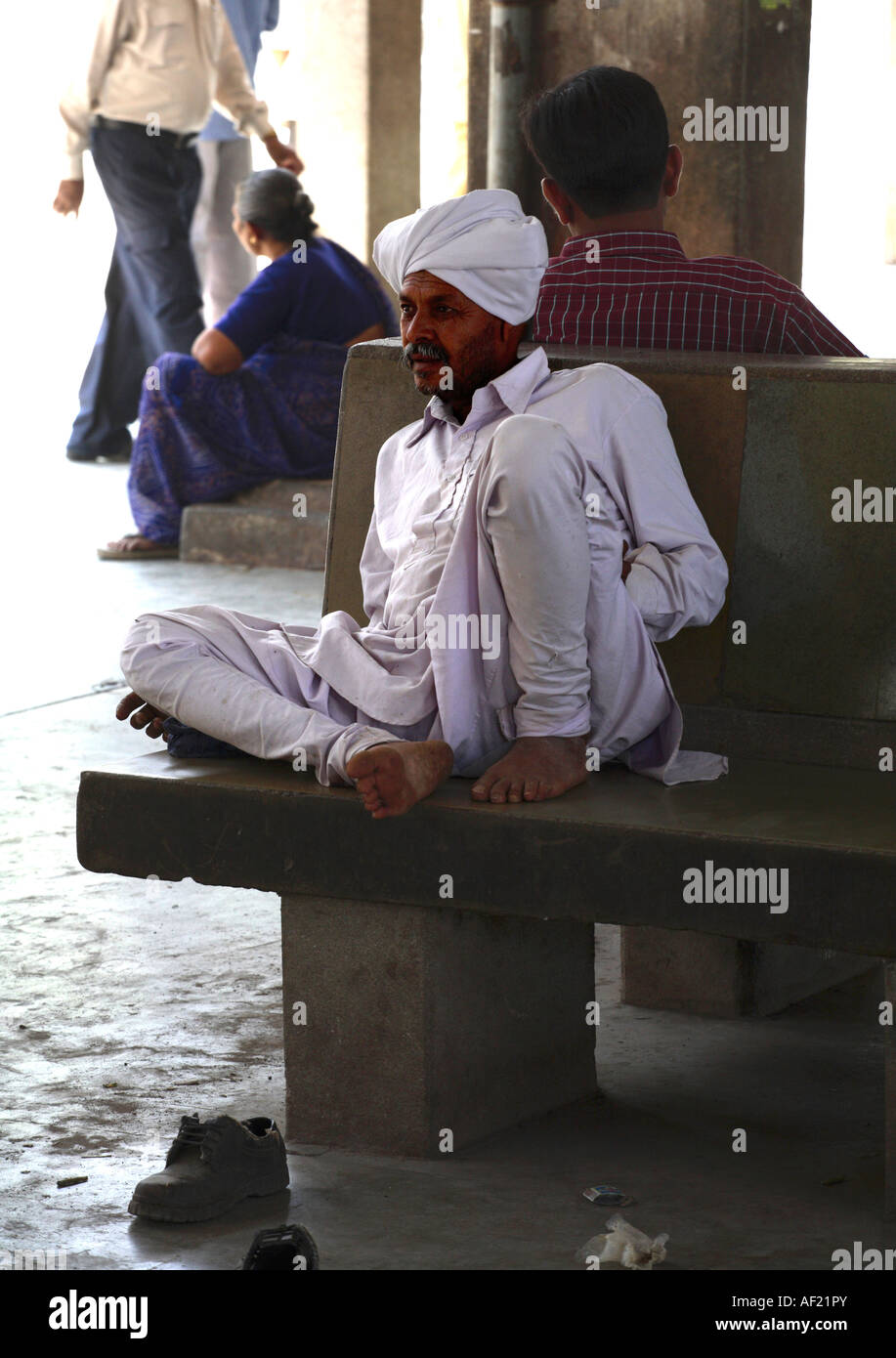 Indian male from Rabari Tribe waiting at Una bus-stand, Gujarat, India Stock Photo