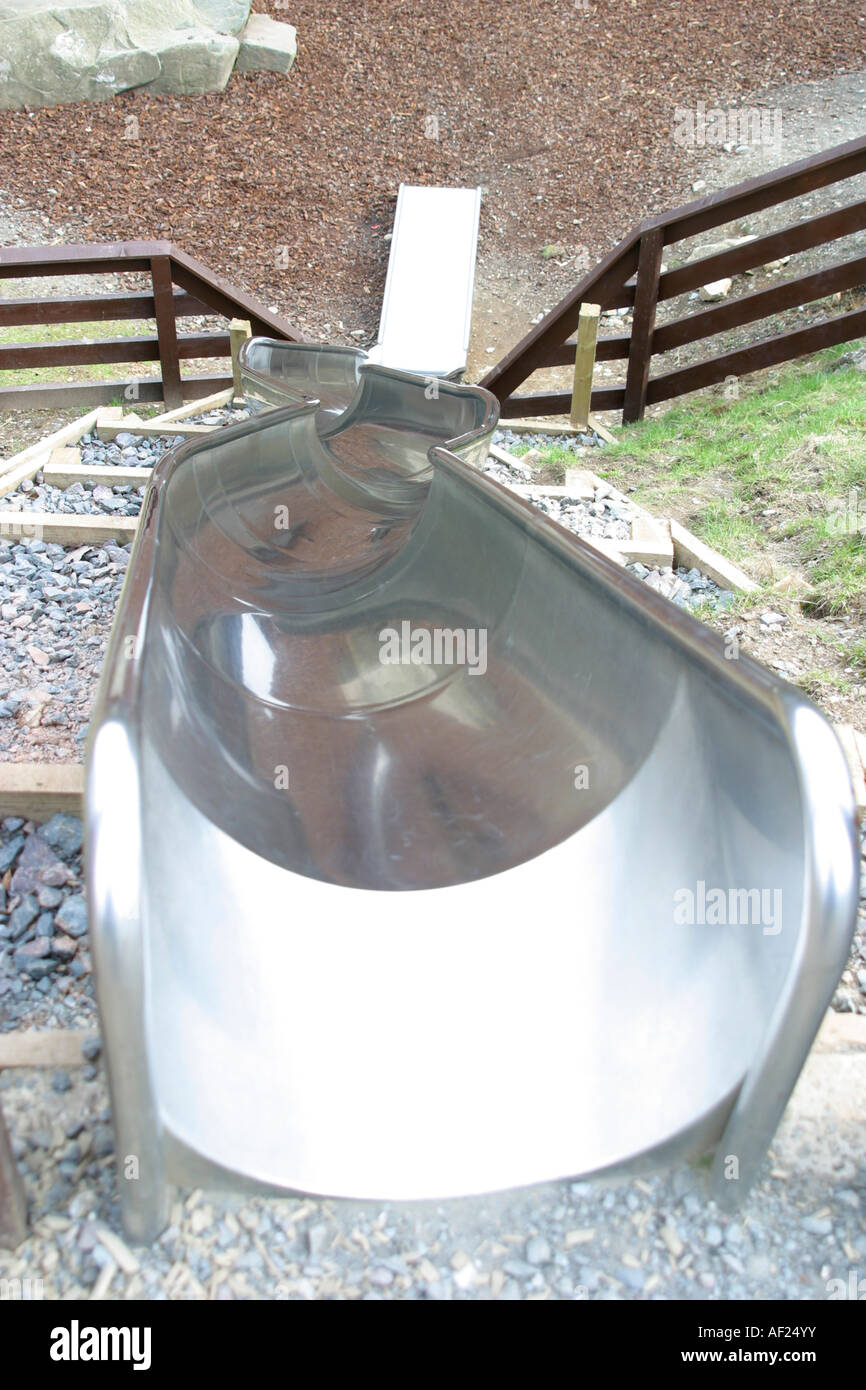 Looking down twisty chute in childrens playground Stock Photo