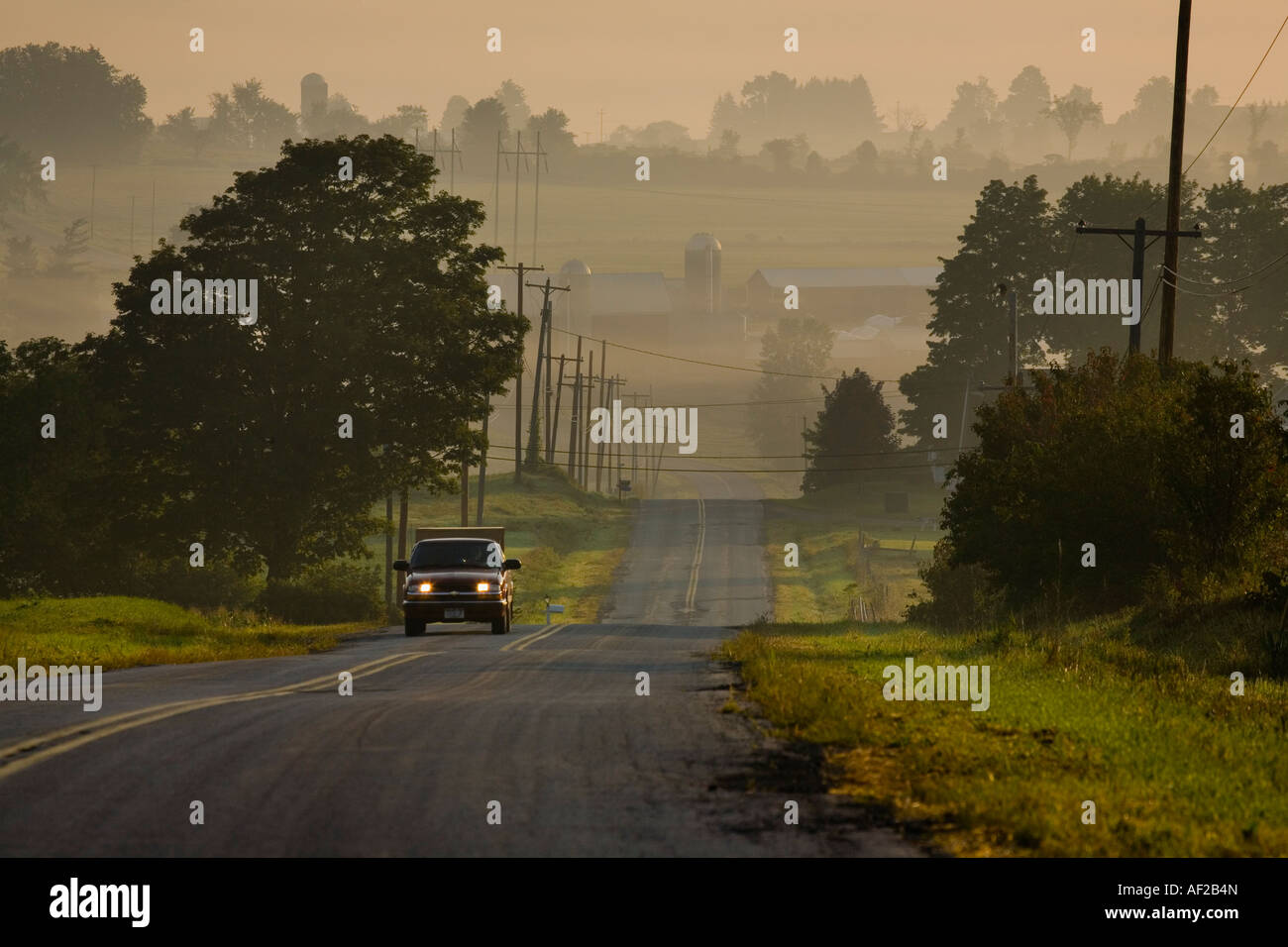 Historic Clinton Road climbing out of morning fog in Mohawk Valley near