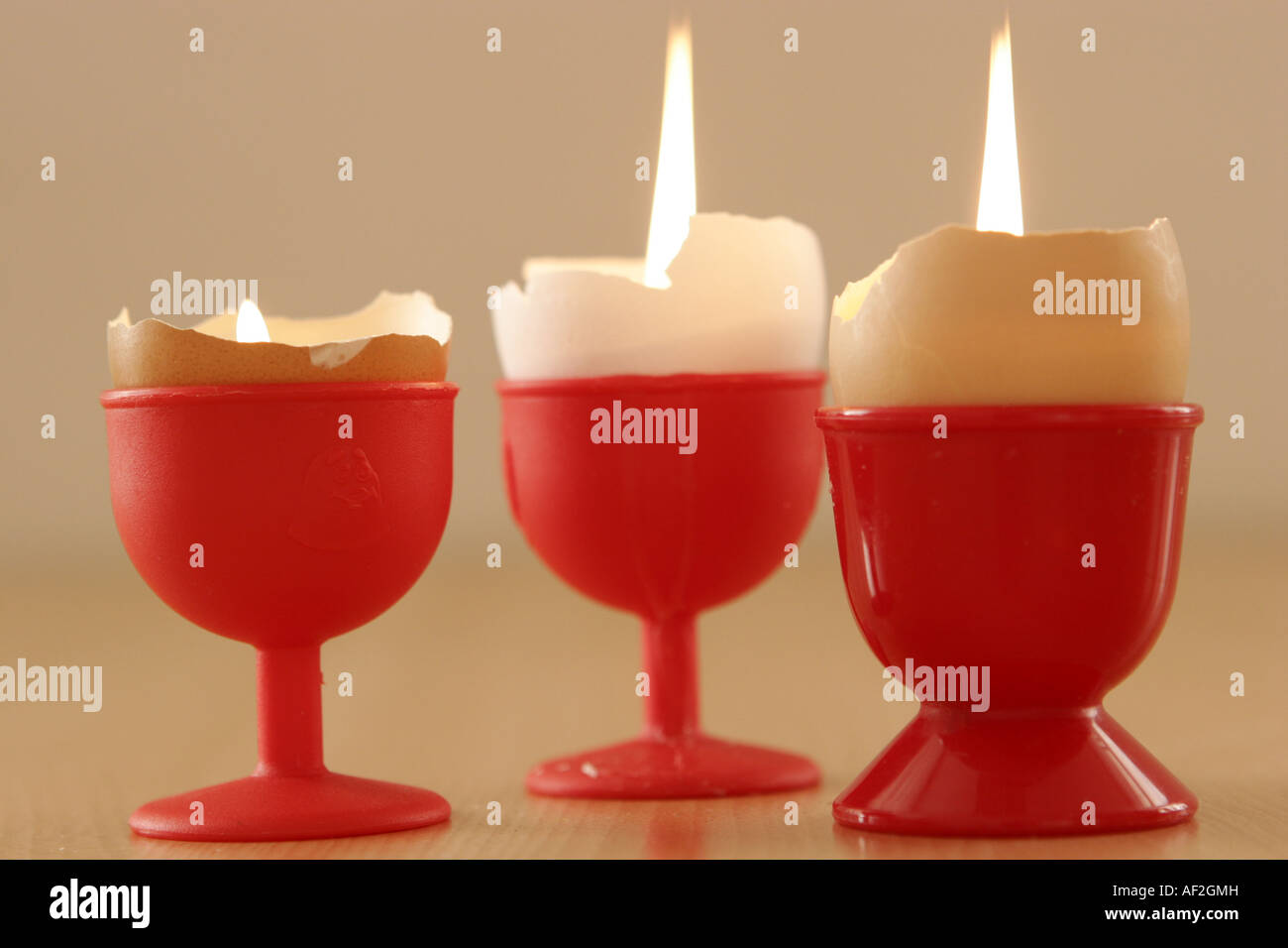 Candles in the eggs Stock Photo Alamy