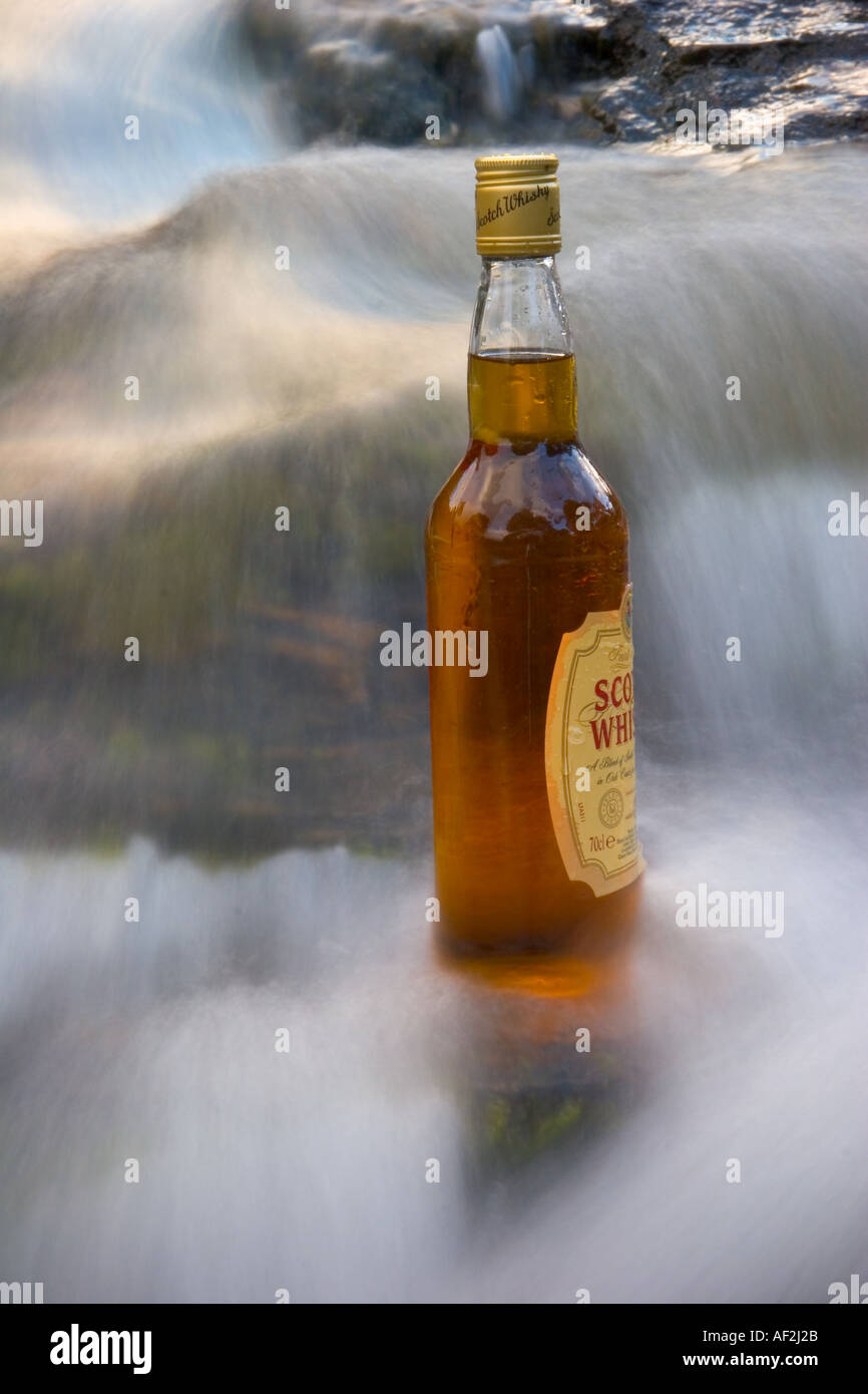Scotch whisky Ice cold from the Cairngorms in burn near Braemar, Cairngorm National Park, Scotland Stock Photo