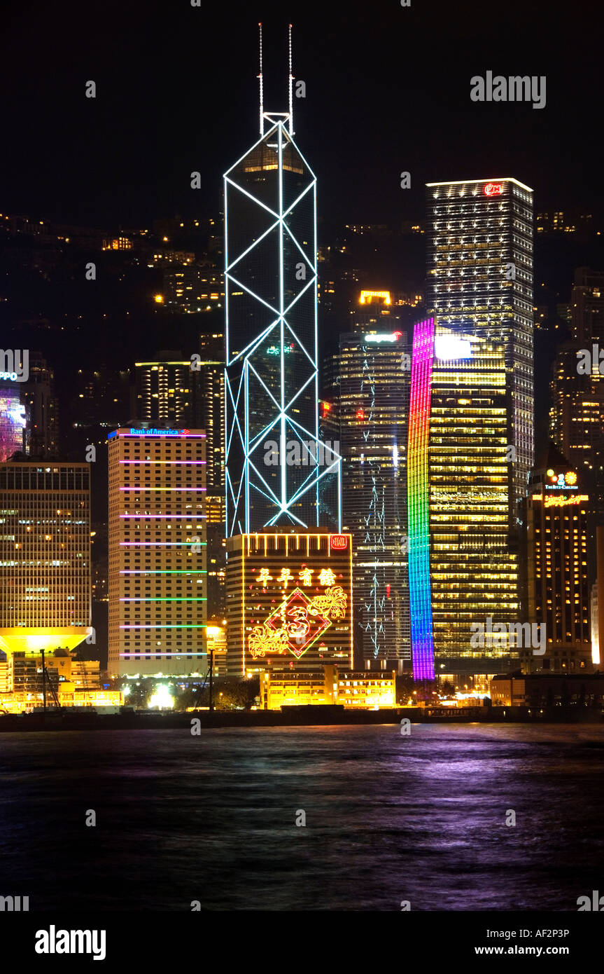 Hong Kong Skyline Lit Up at Night Across the Water Featuring the Bank of China Building, Hong Kong, China, Asia Stock Photo