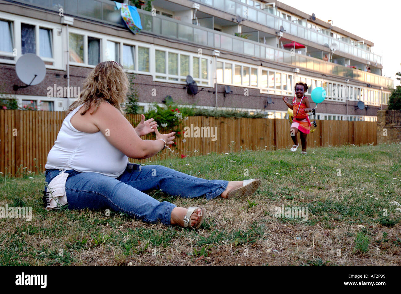 Caucasian mother with mixed race child living in Aylesbury Estate council housing in Peckham South London. Stock Photo
