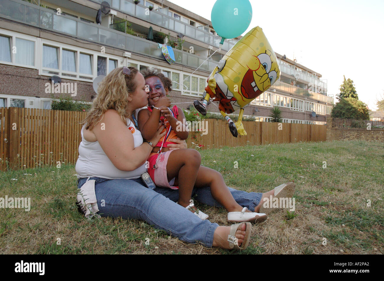 mother with daughter outside Aylesbury Estate in in Peckham South London. Stock Photo