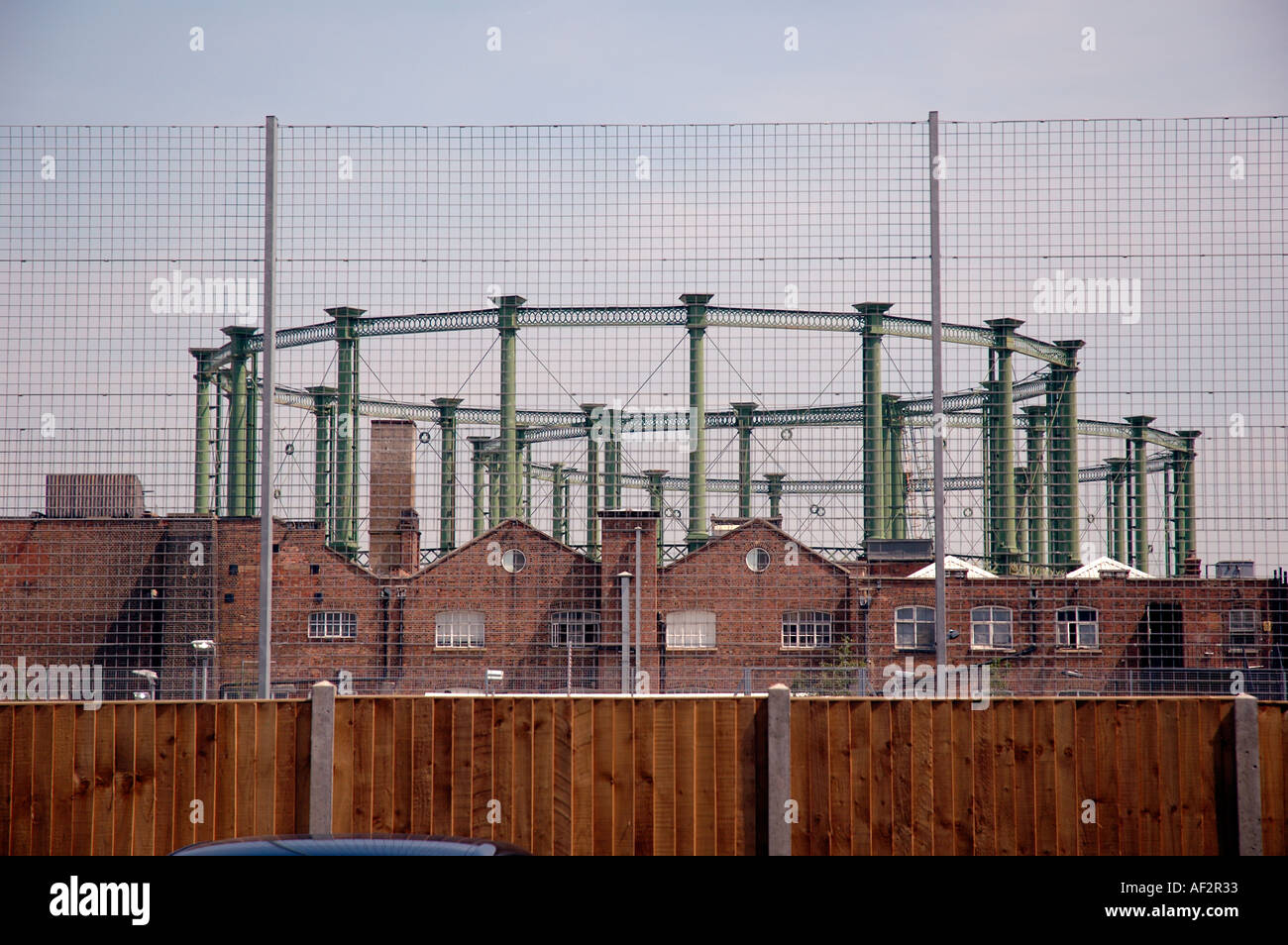 Domestic homes overlooked by gasometer by The Oval Kennington. Stock Photo