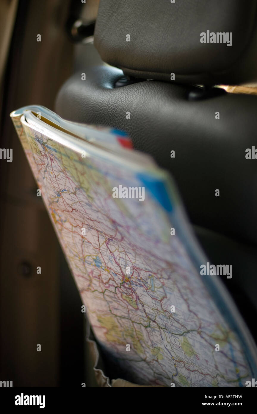 Mapguide Backseat Driver Map in the back of a car seat Stock Photo - Alamy