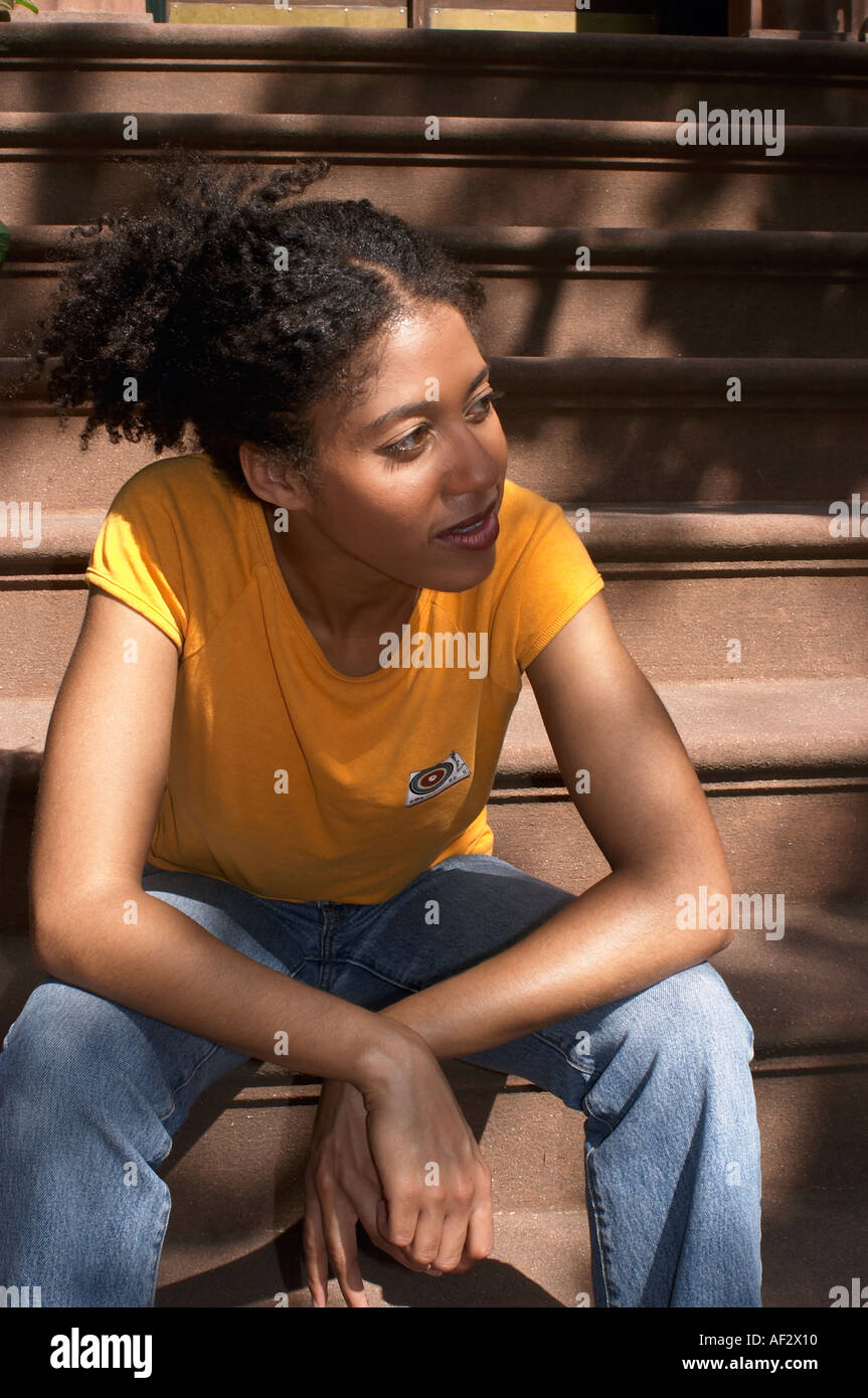 Woman african descent sitting hi-res stock photography and images - Alamy