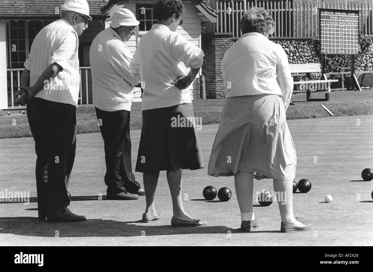 Couples playing boules. Stock Photo