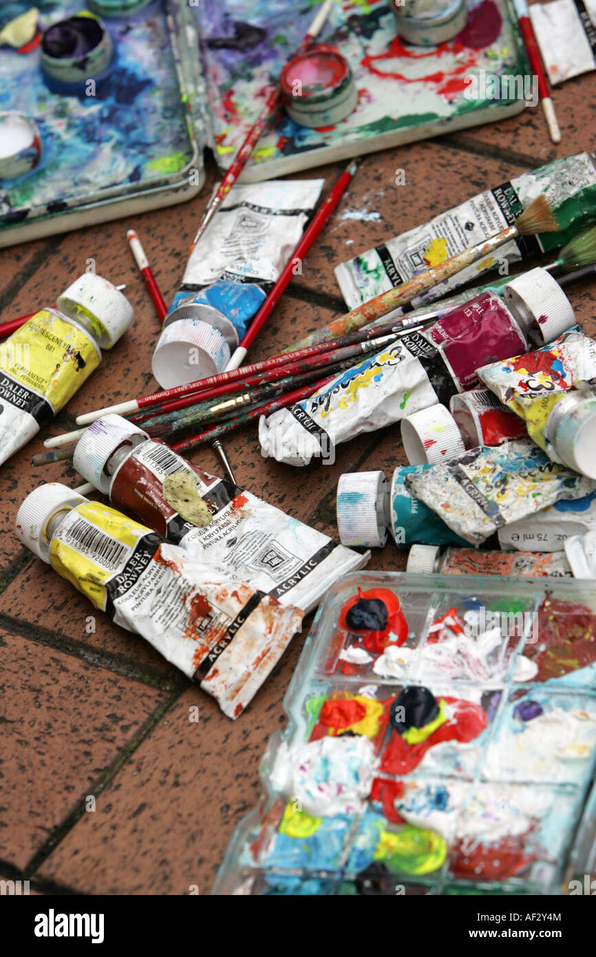 Artists Oil Paint Tubes Open and Used on a Wooden Palette, with