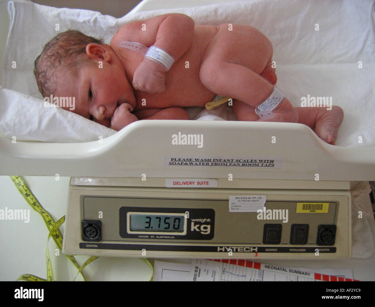 Baby boy birth weight on hospital scales Stock Photo - Alamy
