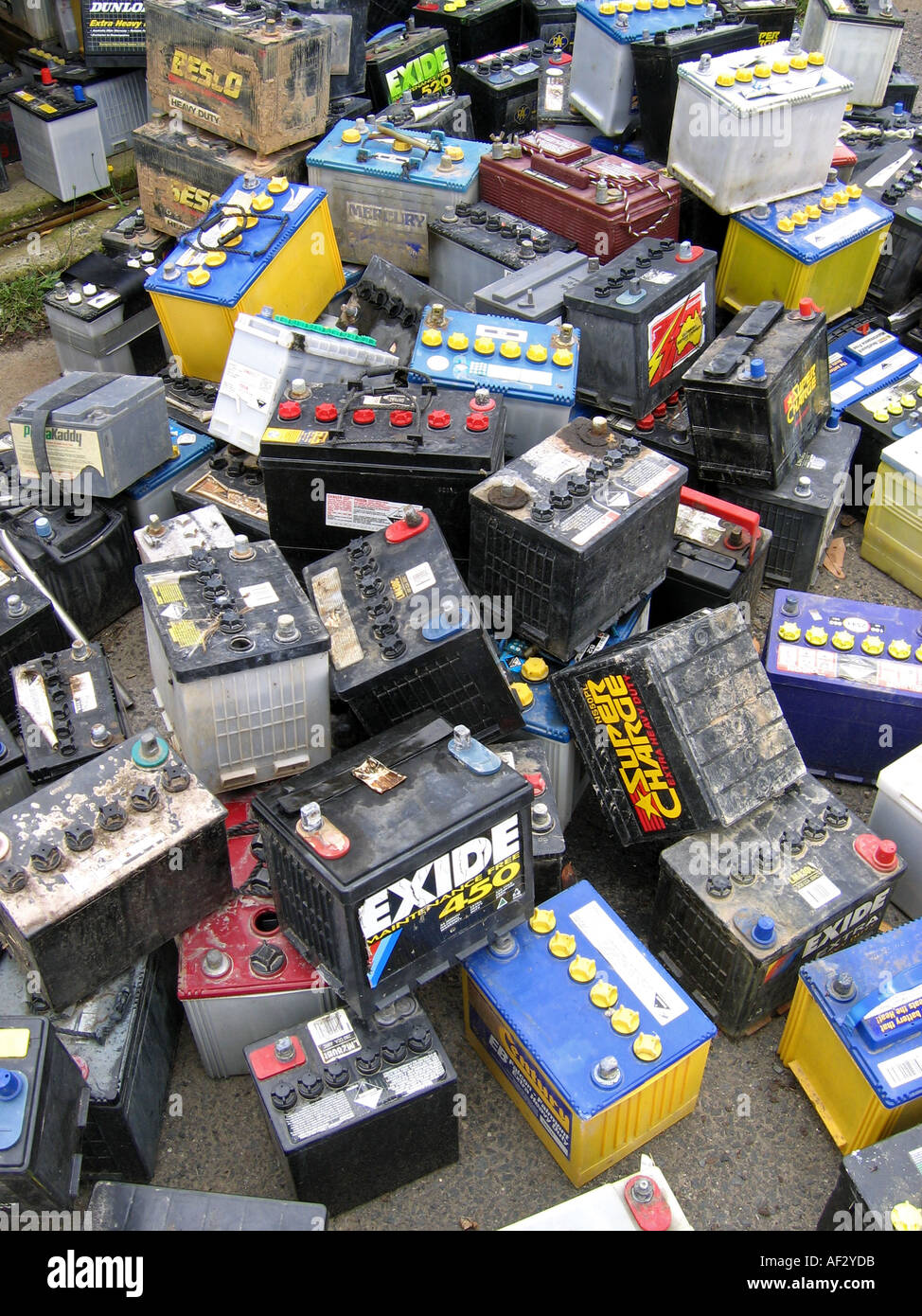 Old car batteries collected at waste station for recycling Stock Photo -  Alamy