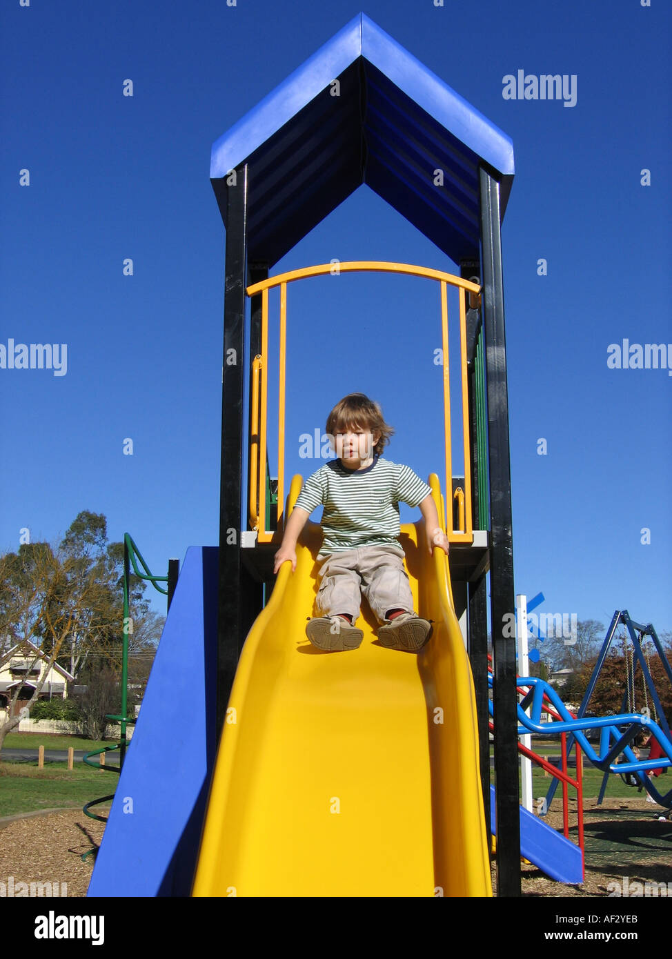 Going down the slide hires stock photography and images Alamy