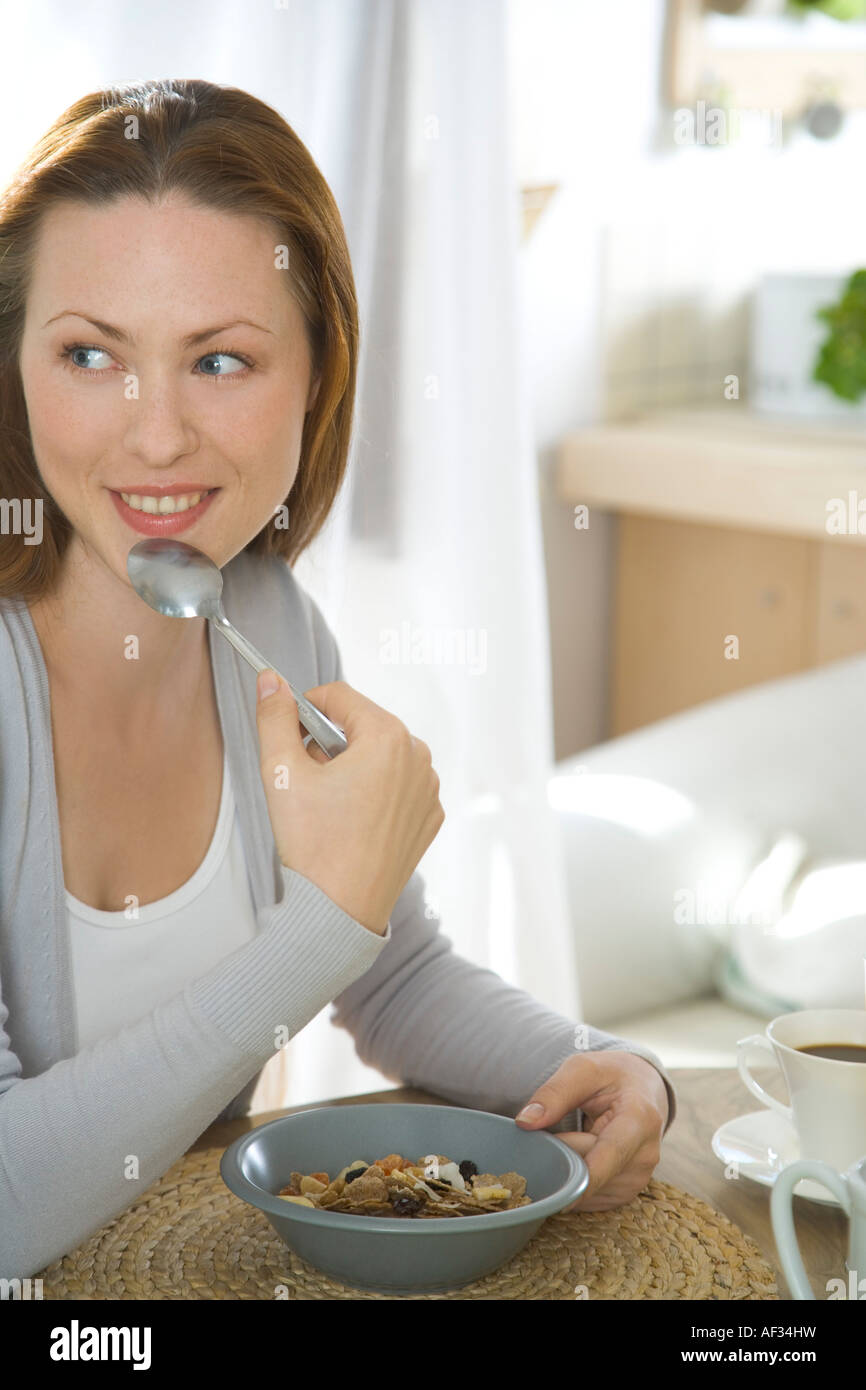 woman eating muesli Stock Photo Alamy