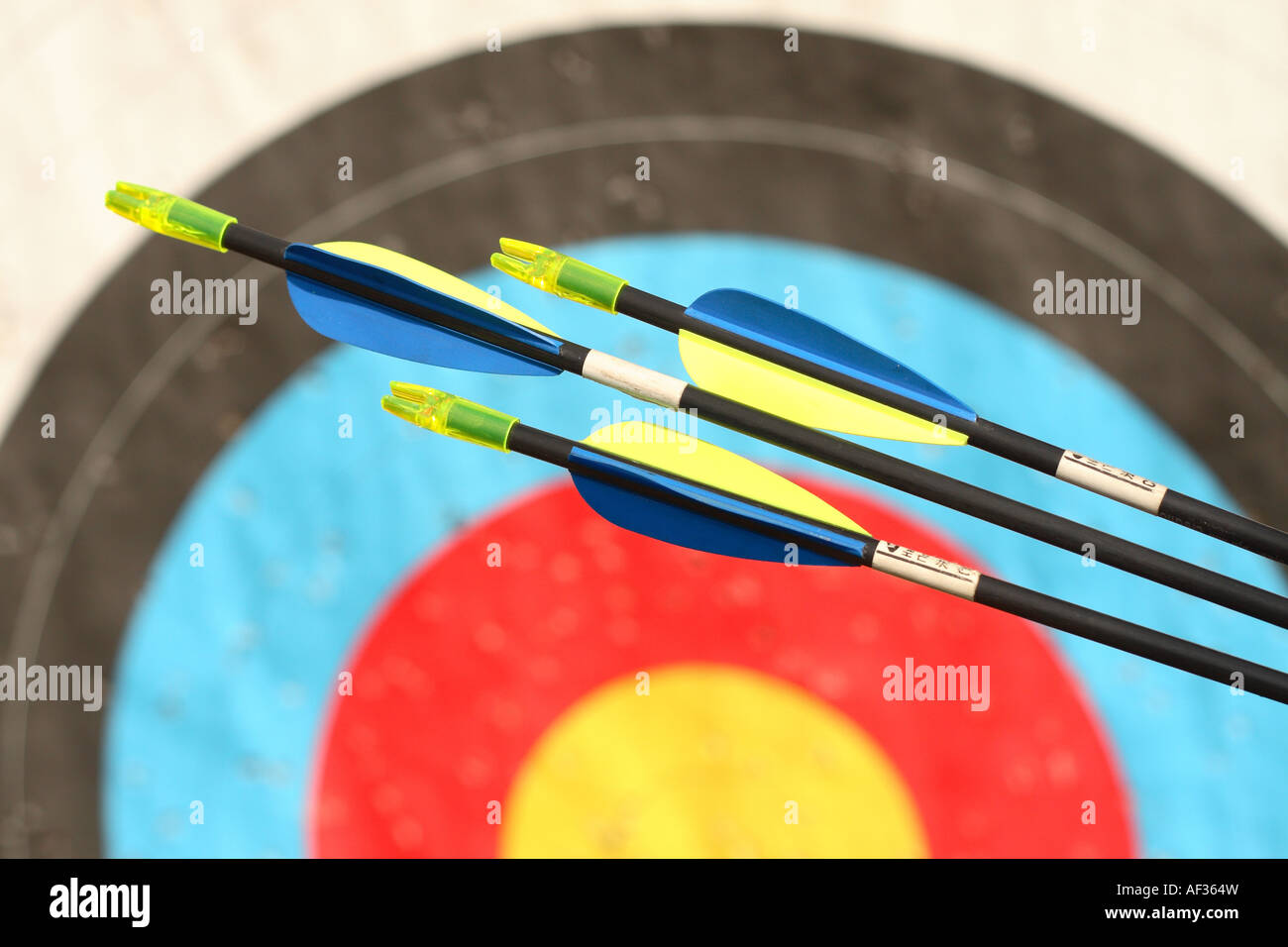 Archery arrows and target board Stock Photo Alamy
