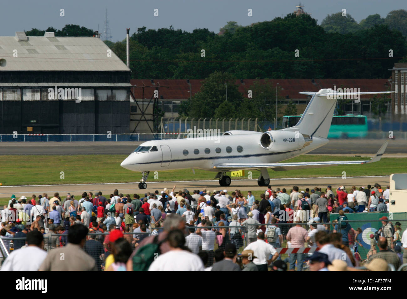 Business jet and spectators Stock Photo