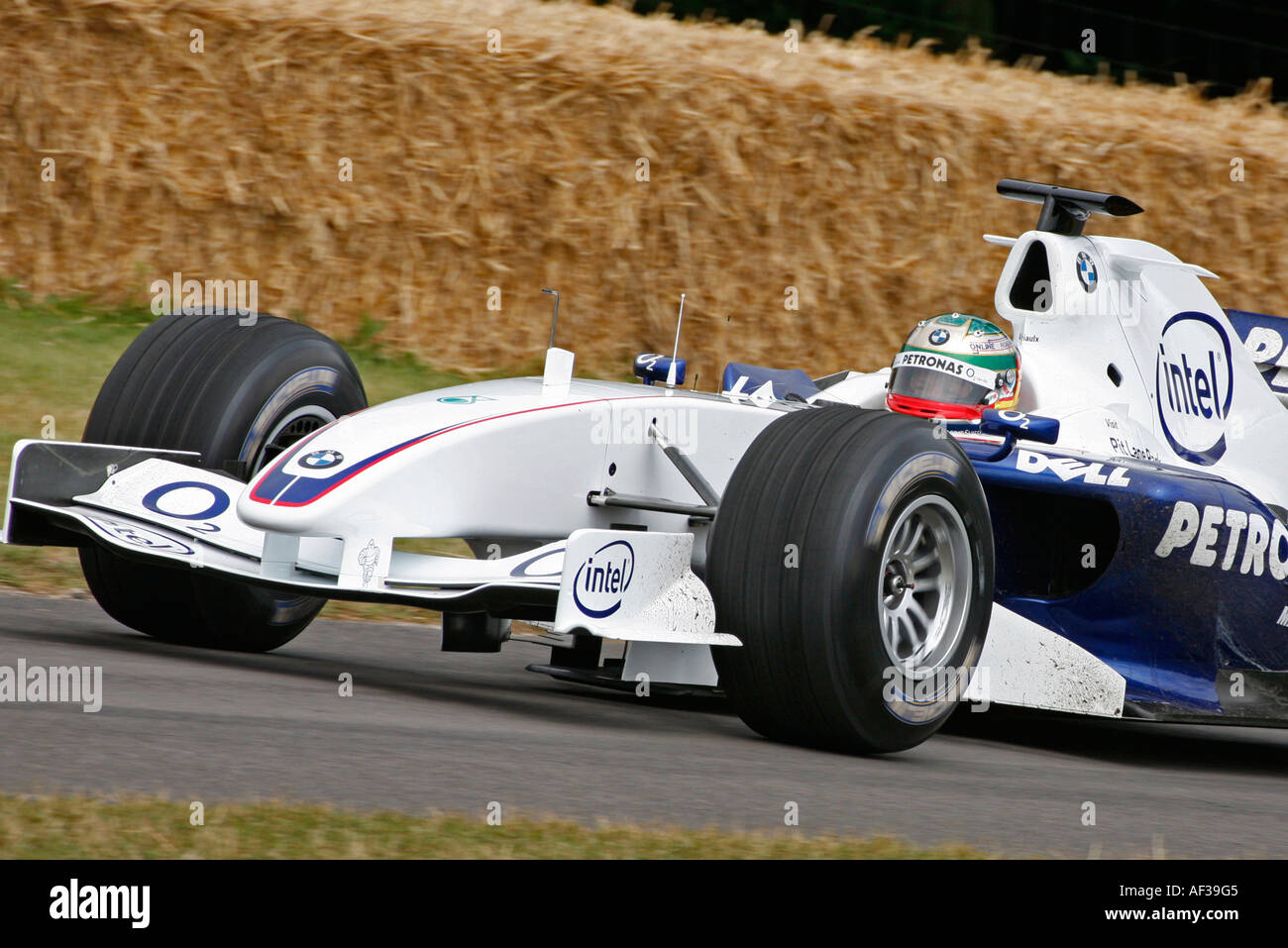 2006 BMW Sauber F1.06 attacks the hillclimb at the Goodwood Festival of Speed, Sussex, England. Stock Photo