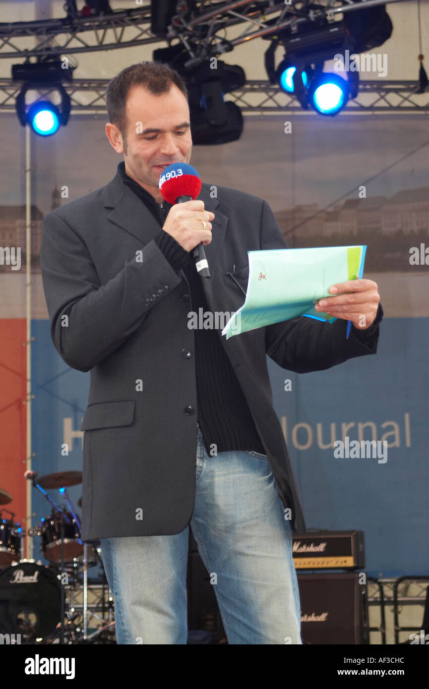Football party in Hamburg. Presenter on a stage Stock Photo