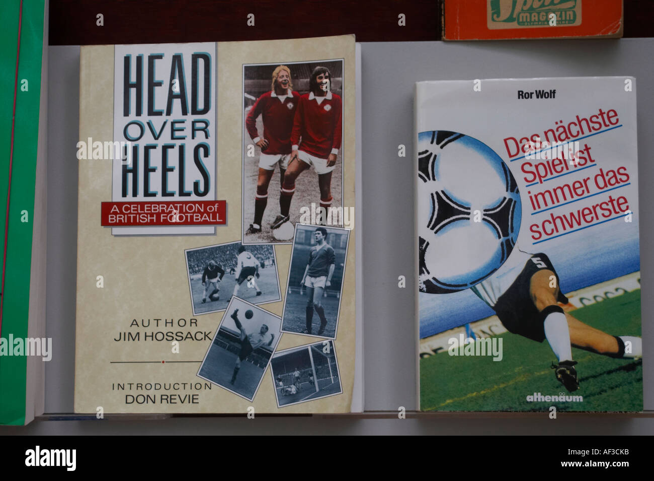 Head over heels. A celebration of british football. and Another books in store. Everyone is crazy about football Stock Photo