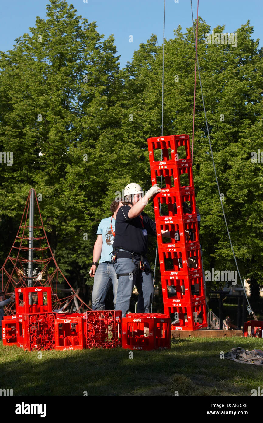 World Cup Festival of the people and cultures. Nice play. Who can put more Cola or beer boxes making the highest tower. Stock Photo