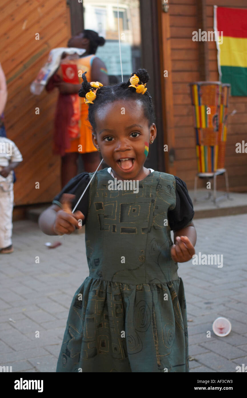 World Cup Festival of the people and cultures. Little girl from Ghana playing Stock Photo