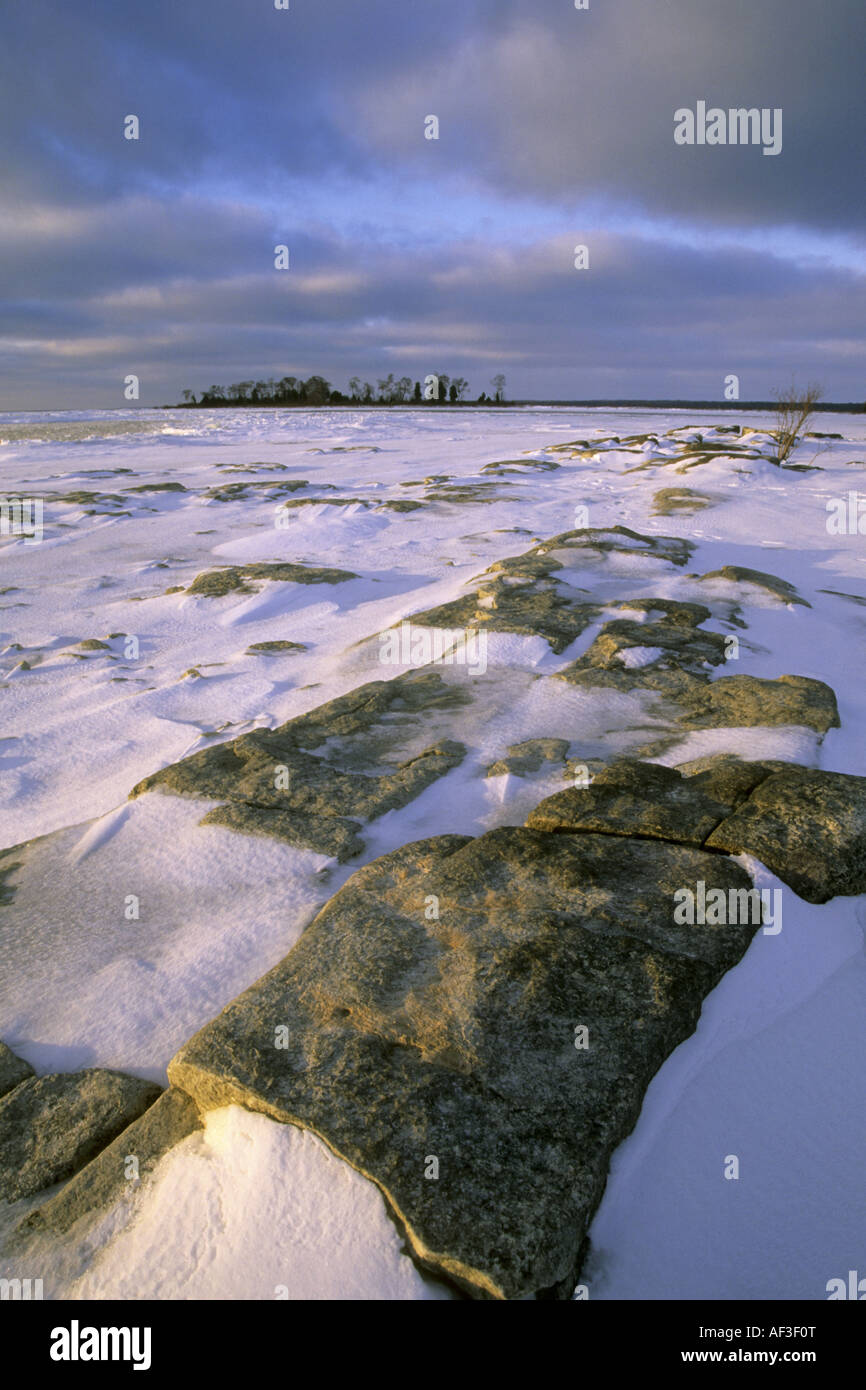 Winter Snow Covers The Rocks And Lake Michigan Shore Just After